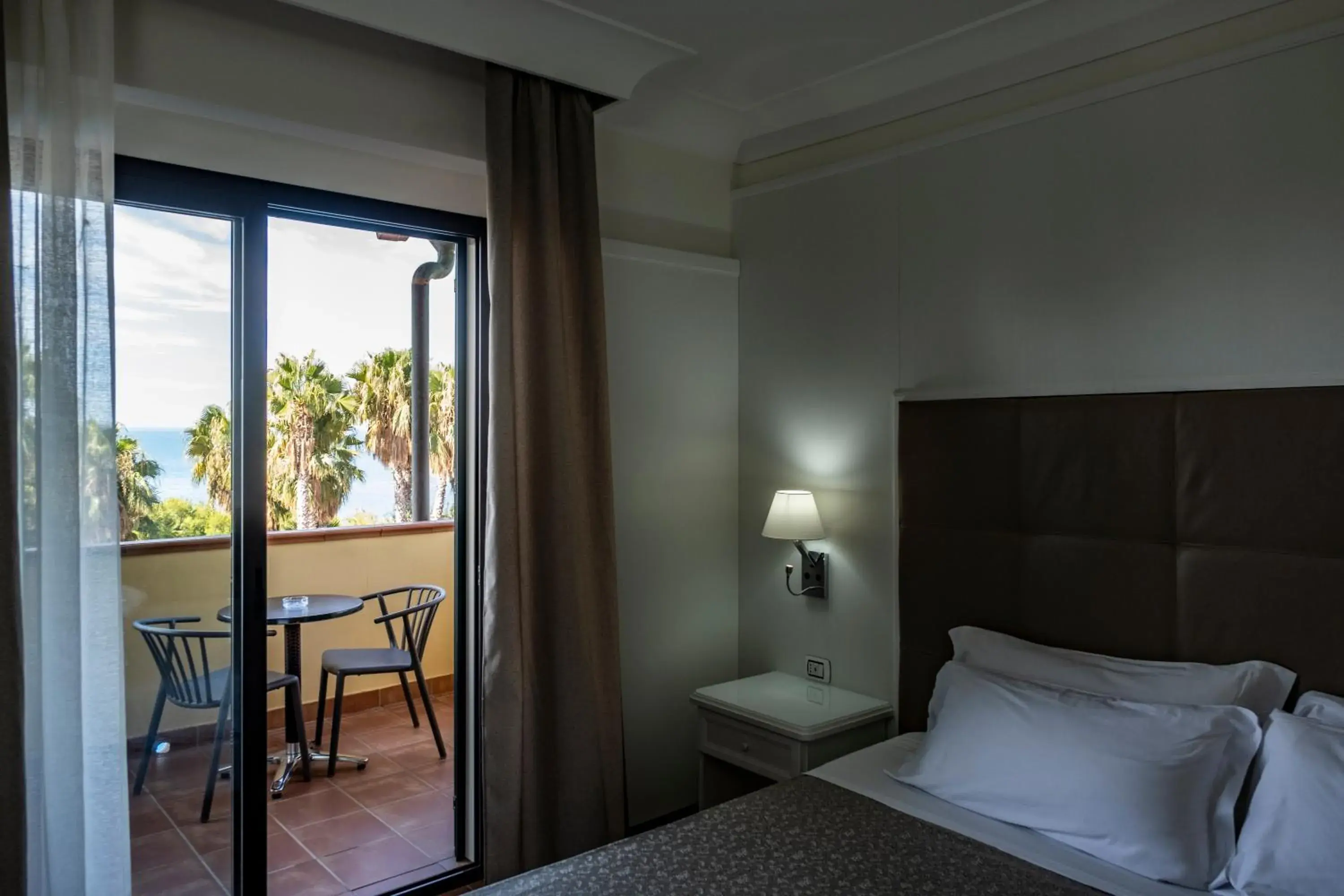 Balcony/Terrace, Bed in Baia Di Ulisse Wellness & Spa Balcony/Terrace, Bed in Baia Di Ulisse Wellness & Spa