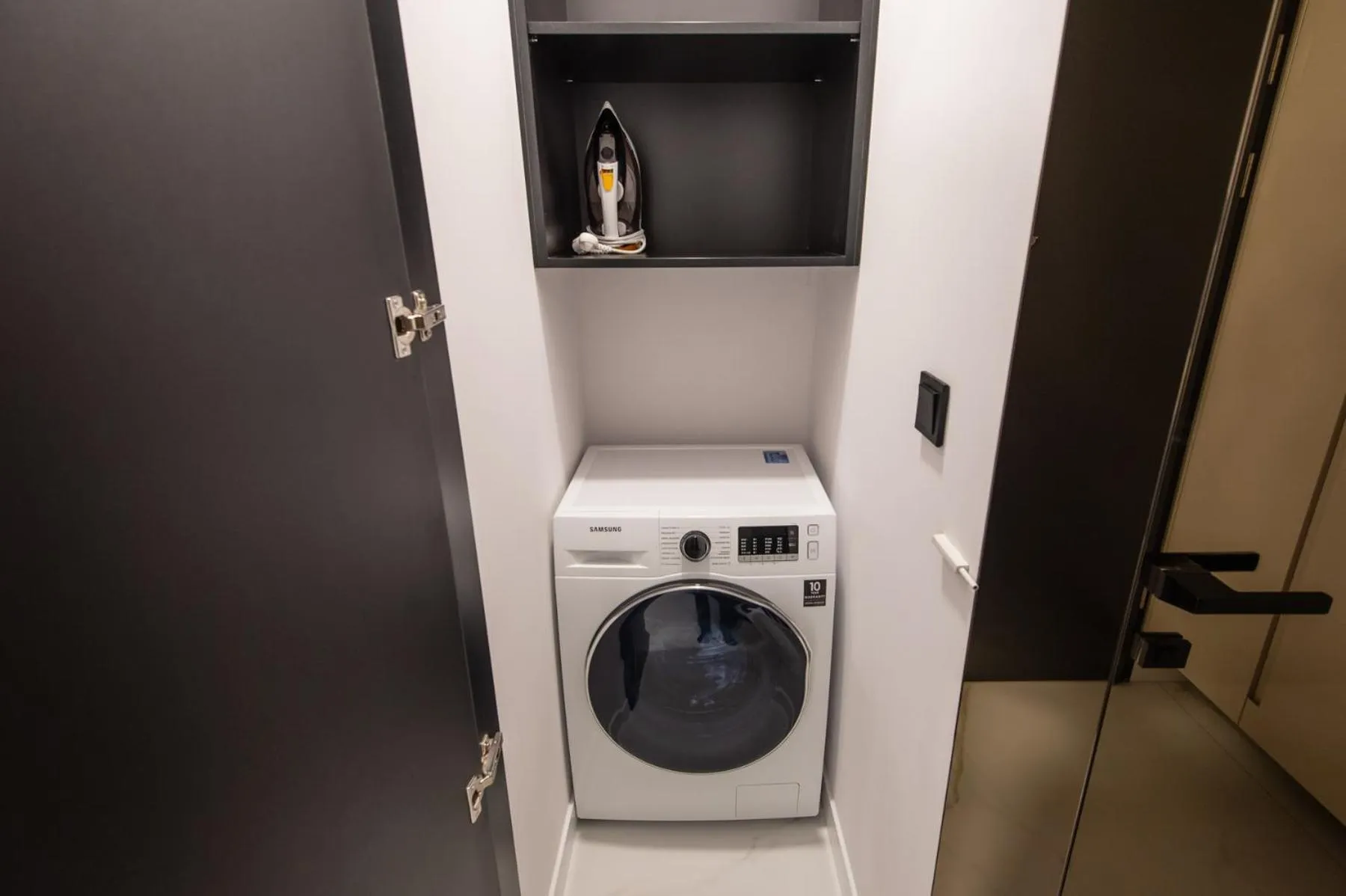 washing machine in Super-Apartamenty VIP Jacuzzi II