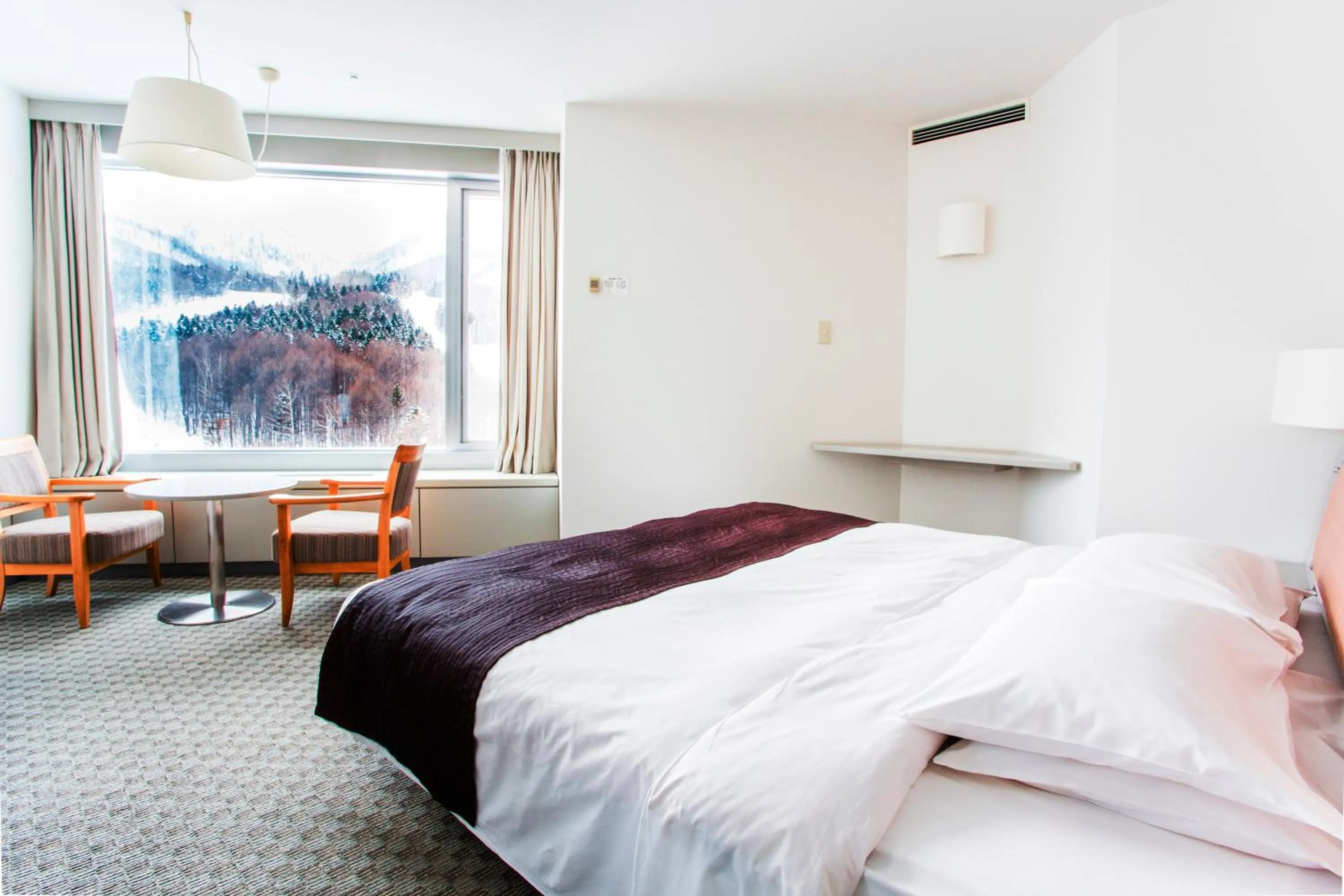 Bedroom, Bed in Shin Furano Prince Hotel