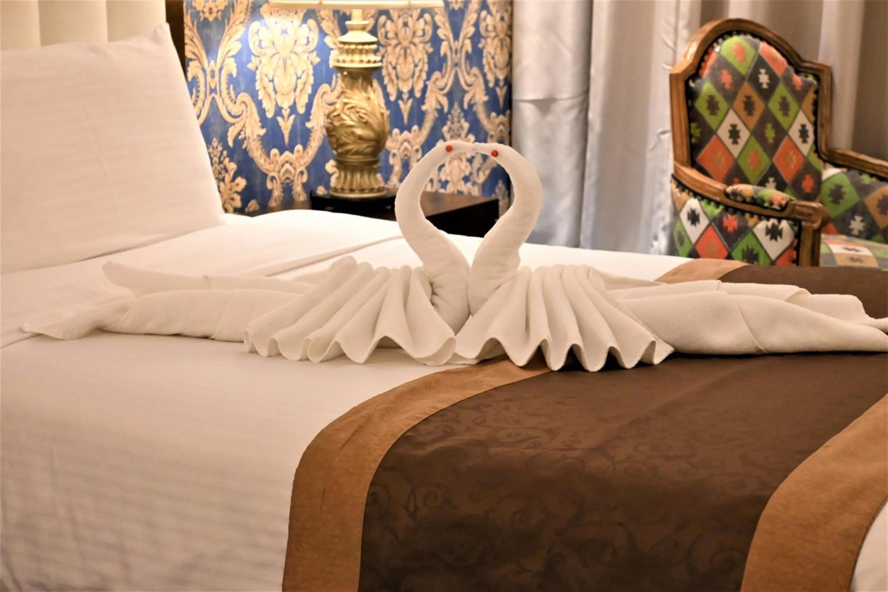 Bed in Crystal Plaza Al Majaz Hotel