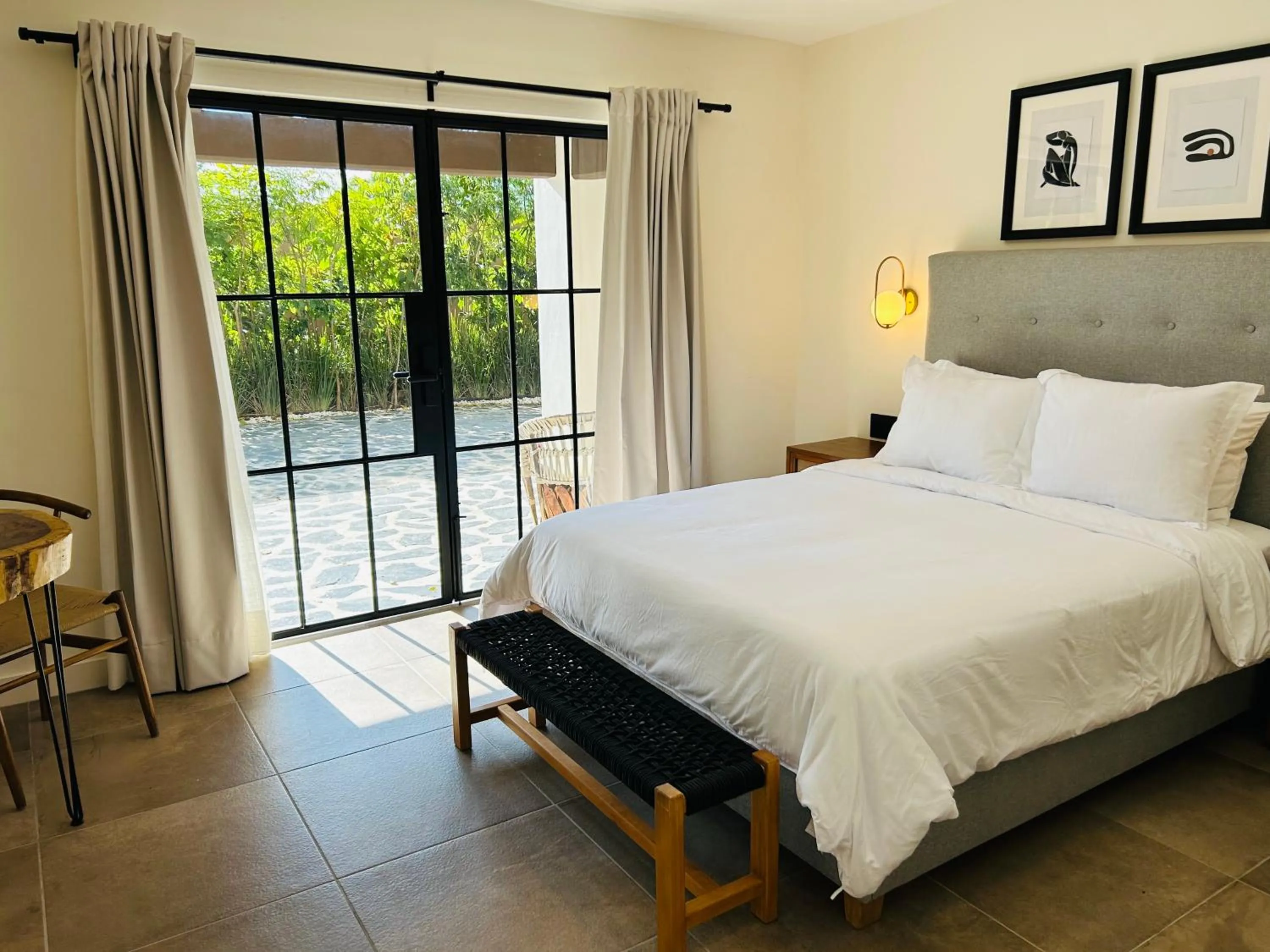 Bed in Tatala Hotel & Garden