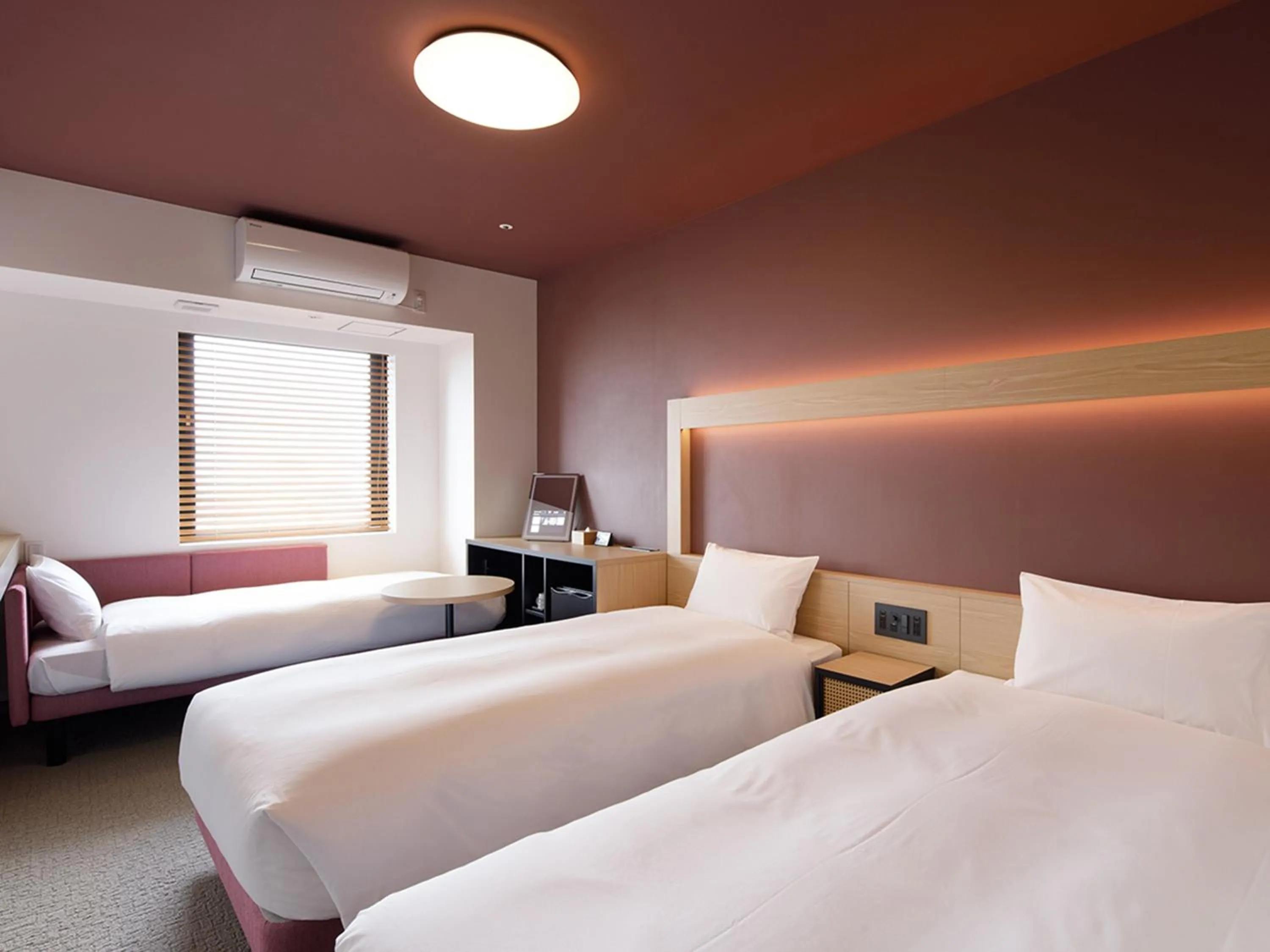 Photo of the whole room, Bed in hotel androoms Naha Port