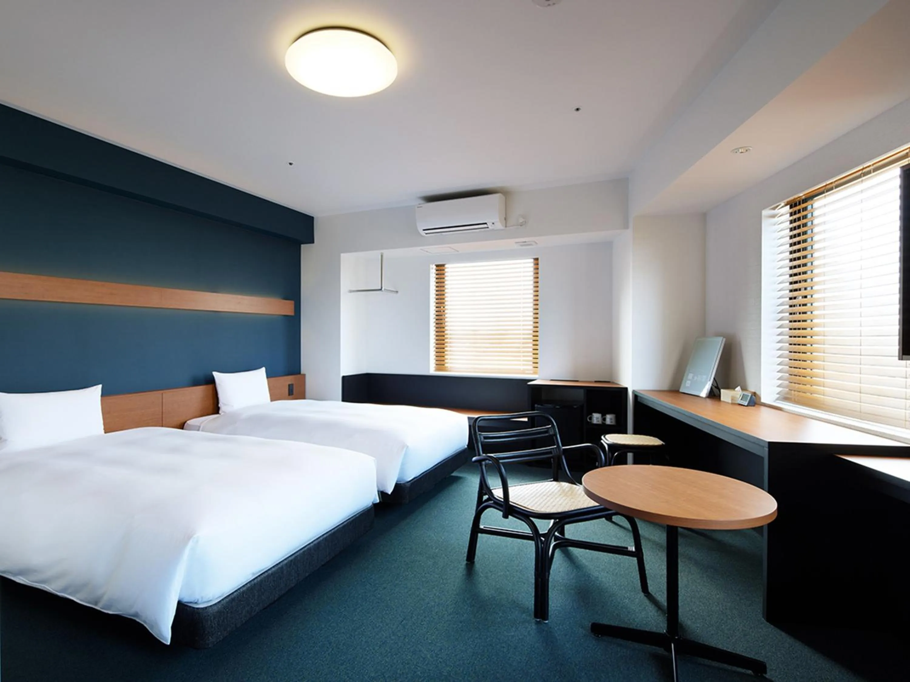 Photo of the whole room, Bed in hotel androoms Naha Port