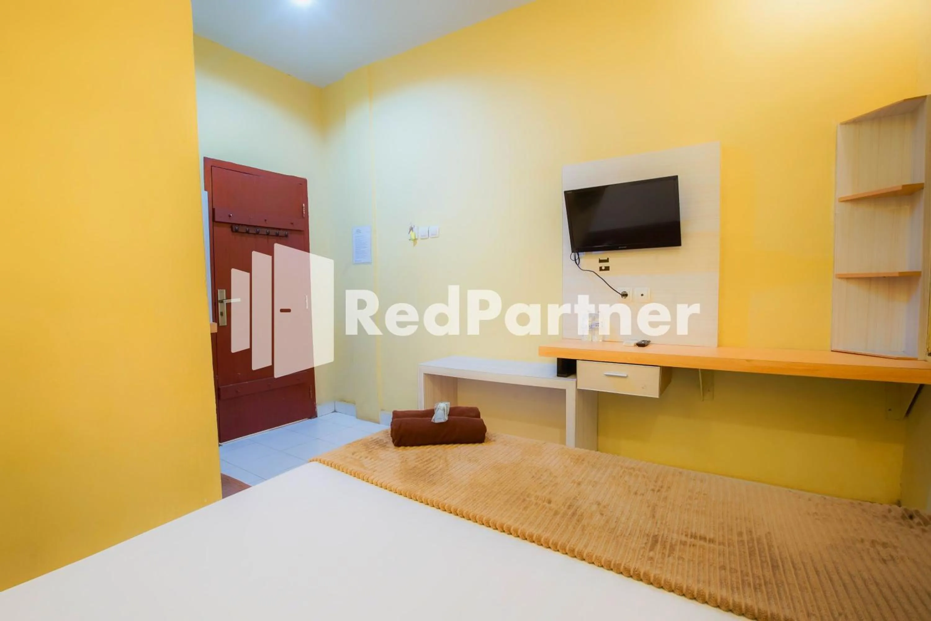 Bedroom, Bed in Hatta Guest House Syariah near Hayam Wuruk Jelutung Mitra RedDoorz