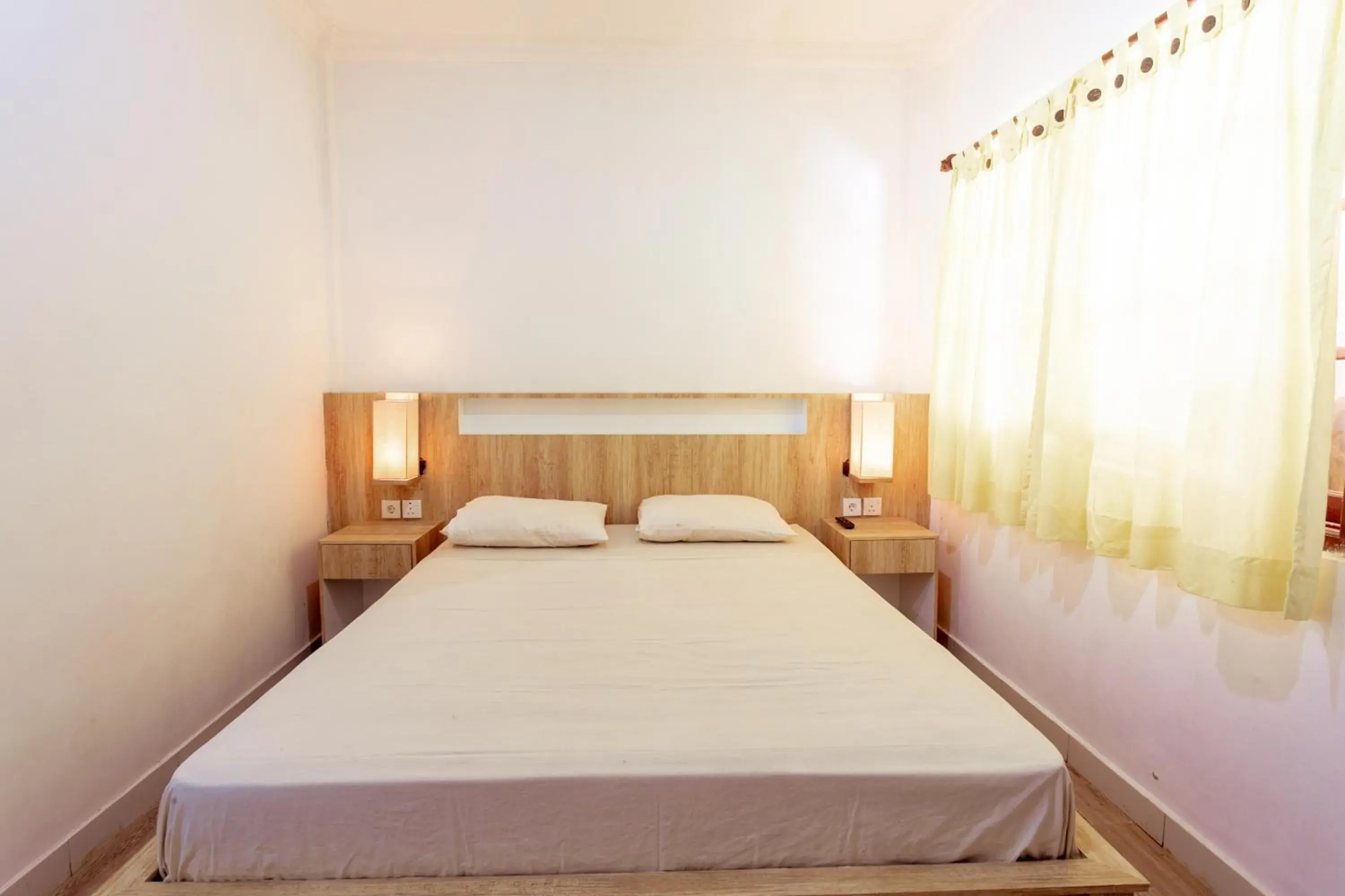 Standard Double or Twin Room with Fan in Segara Sadhu Inn Kuta by ecommerceloka Standard Double or Twin Room with Fan in Segara Sadhu Inn Kuta by ecommerceloka