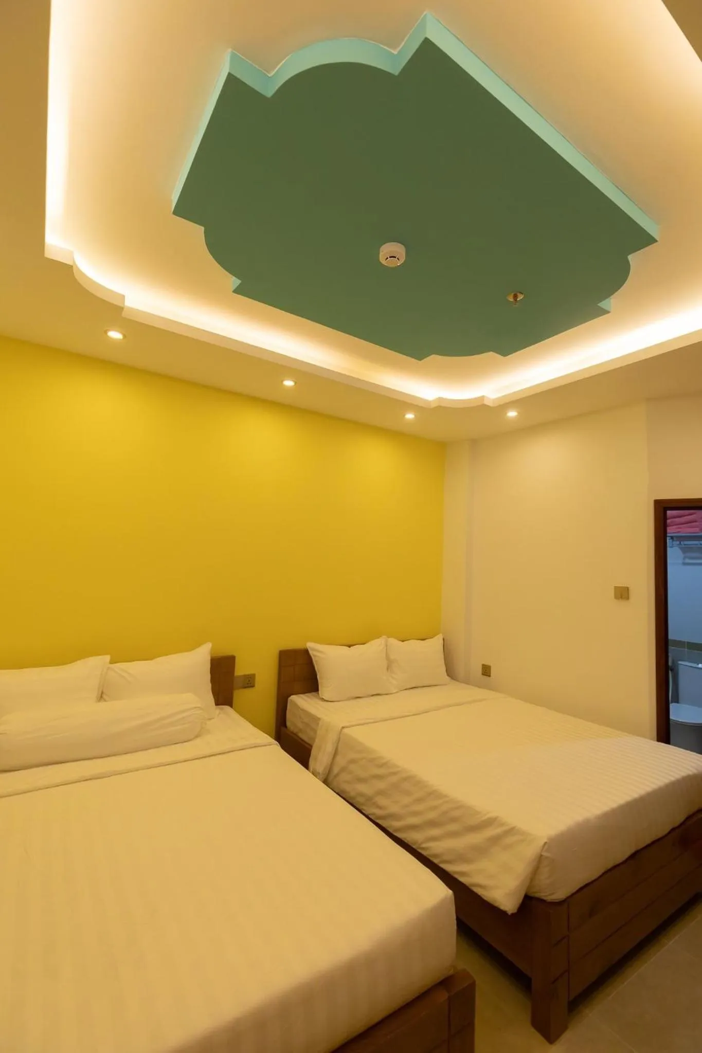 Bed in 26 Topaz Hotel