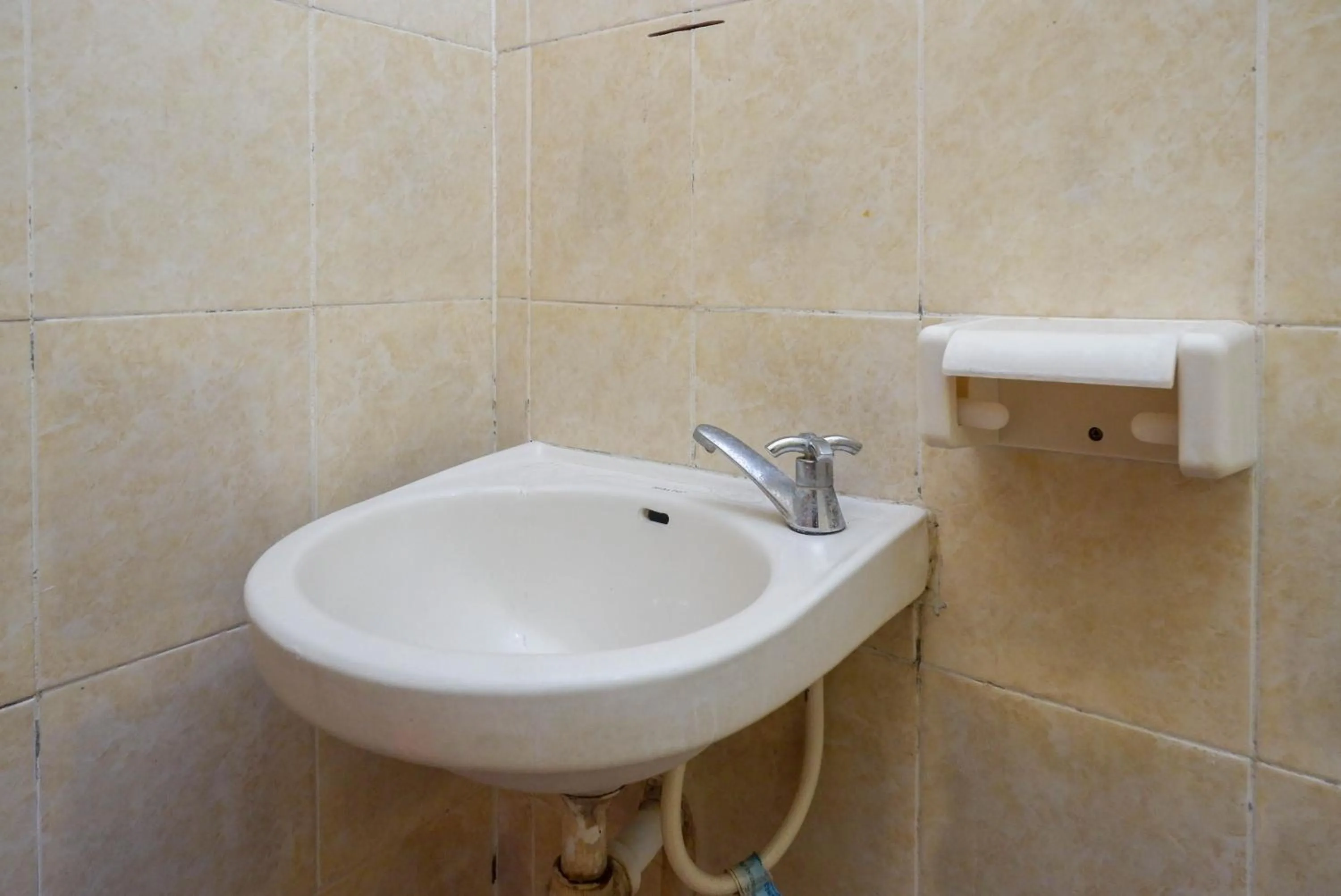 Bathroom in Hotel Widodo 1 Parangtritis RedPartner