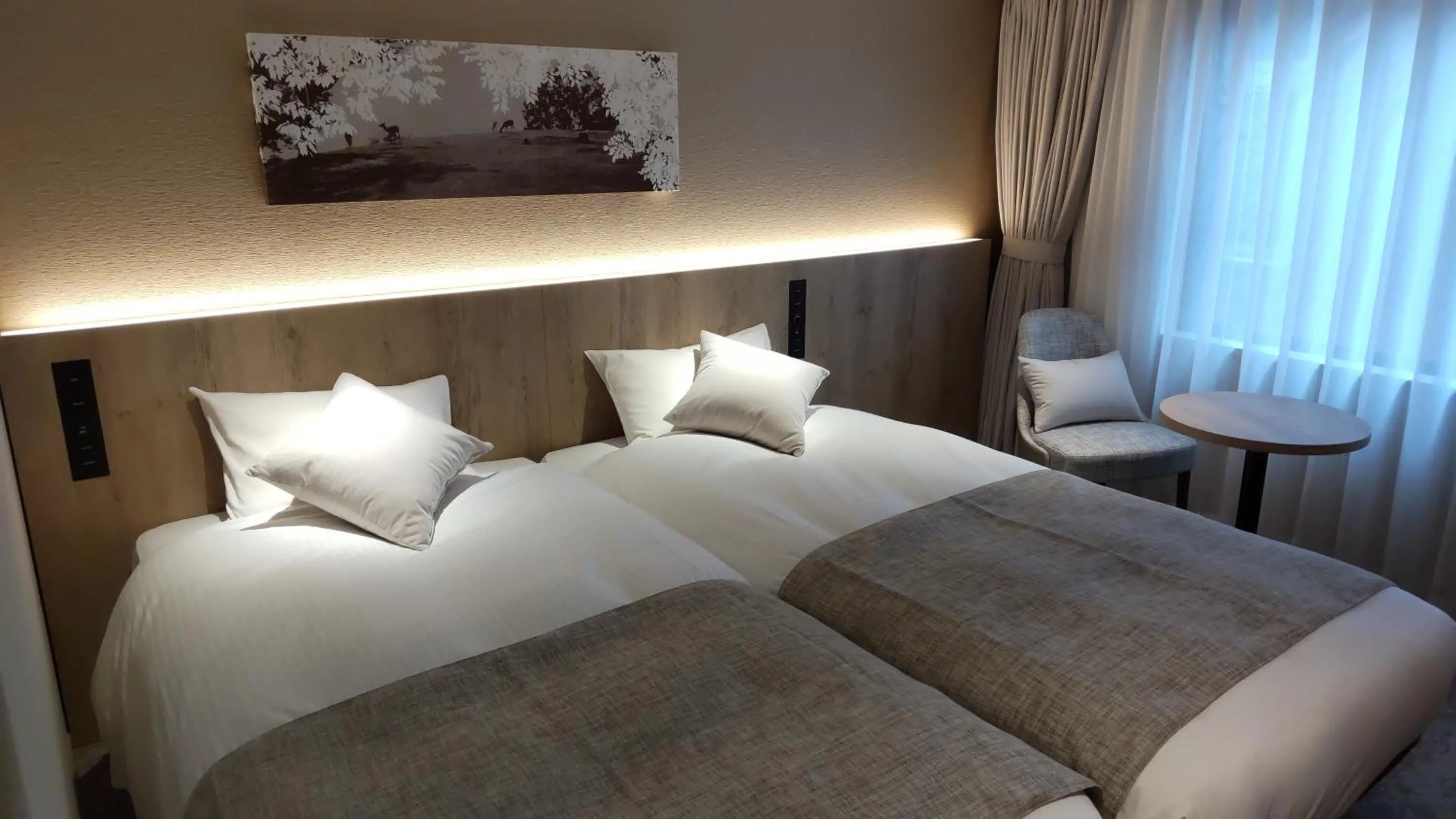 Bed in Iroha Grand Hotel Kintetsu Nara Ekimae