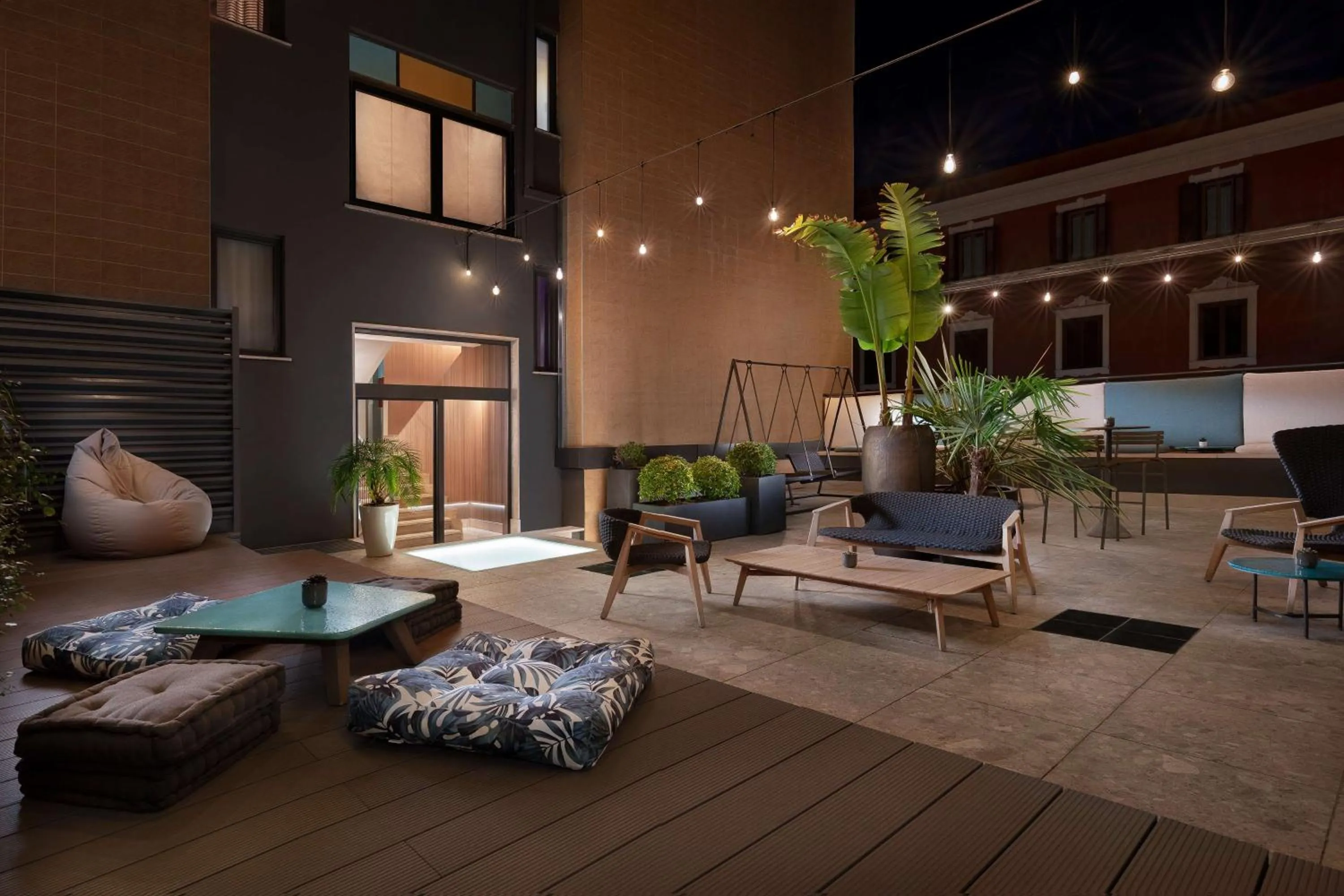 Patio in The Spring House Hotel Rome Vatican, Tapestry Collection Hilton