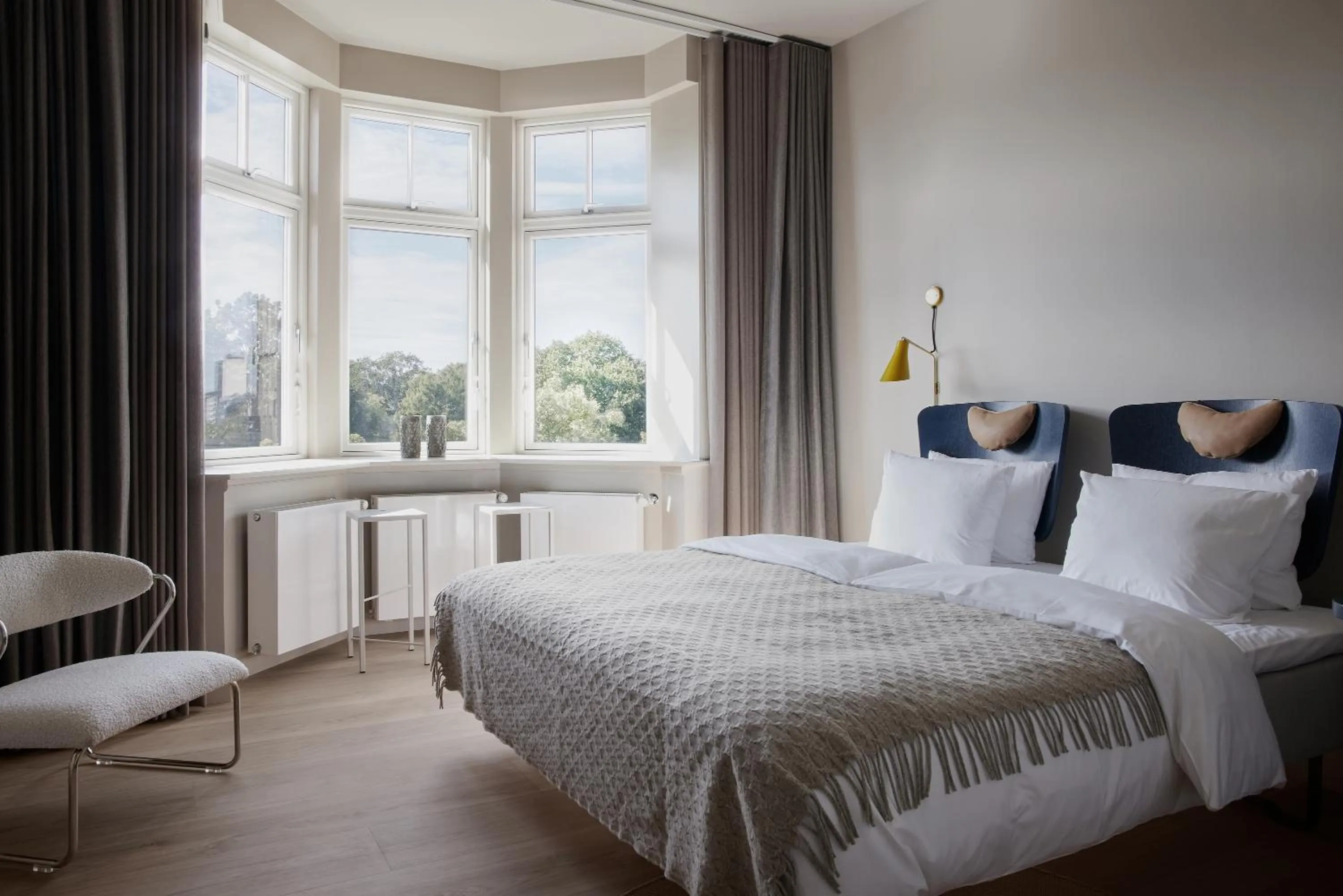 Bed in Apartments by Brøchner Hotels