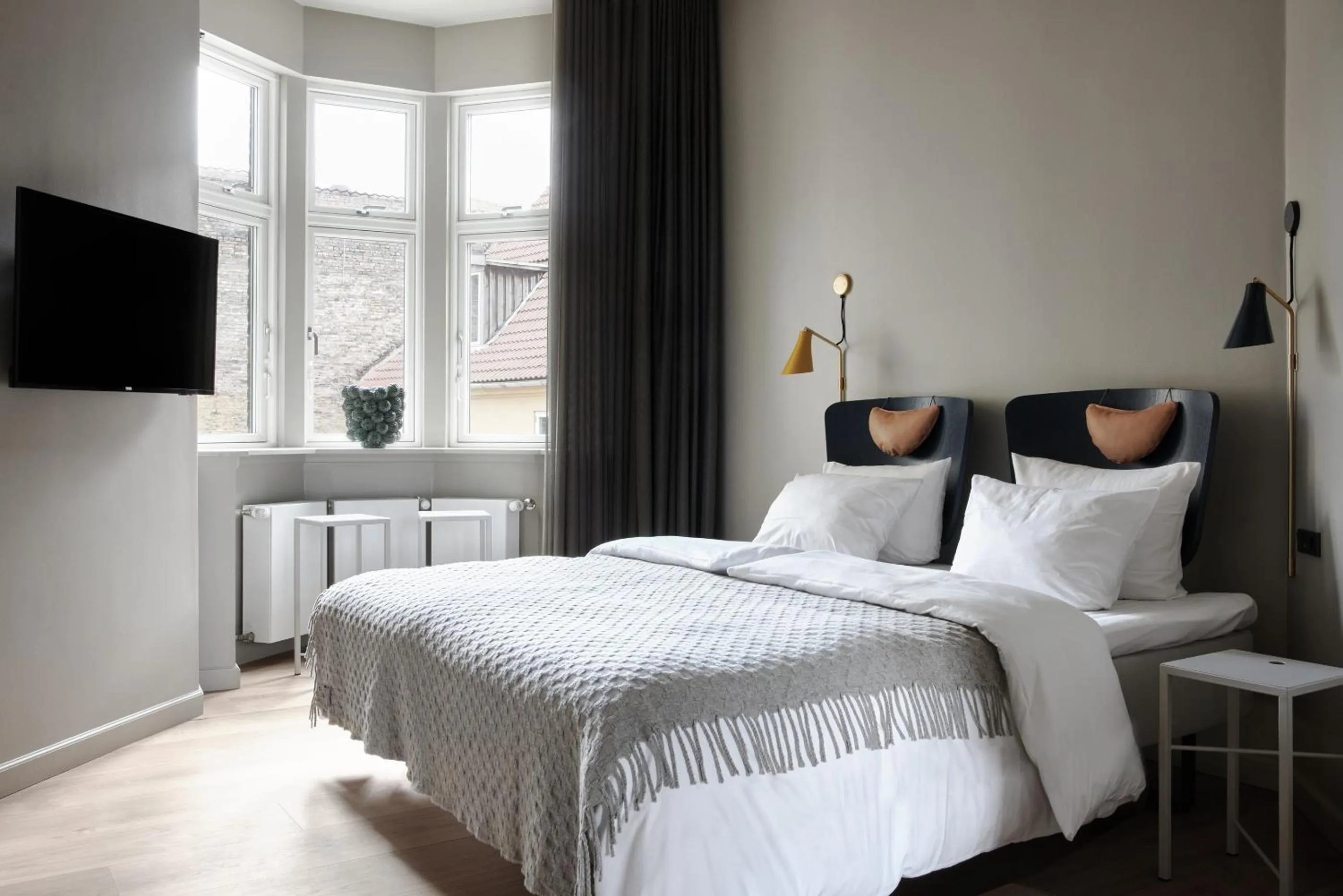 Bed in Apartments by Brøchner Hotels