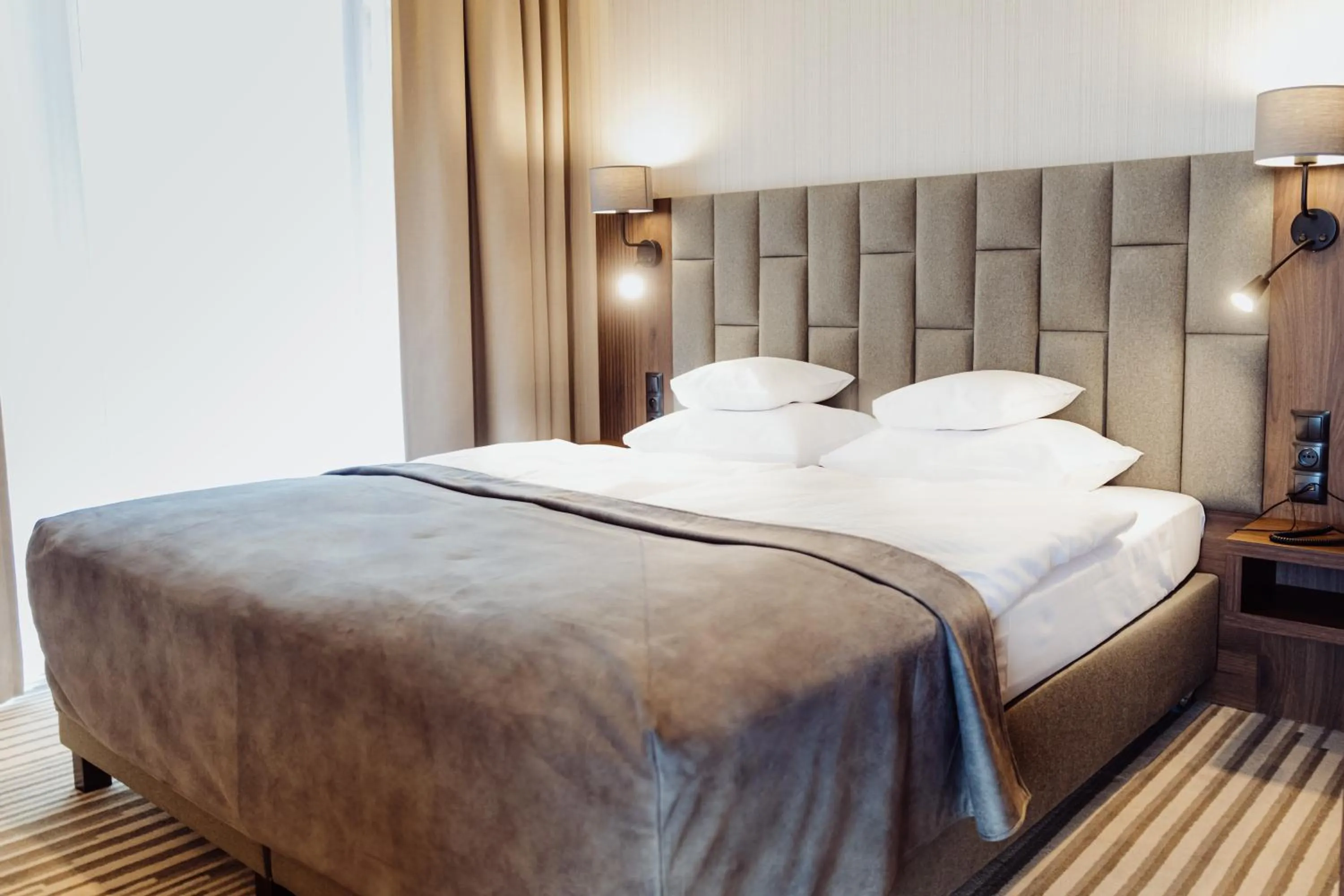 Bed in Elements Hotel&Spa