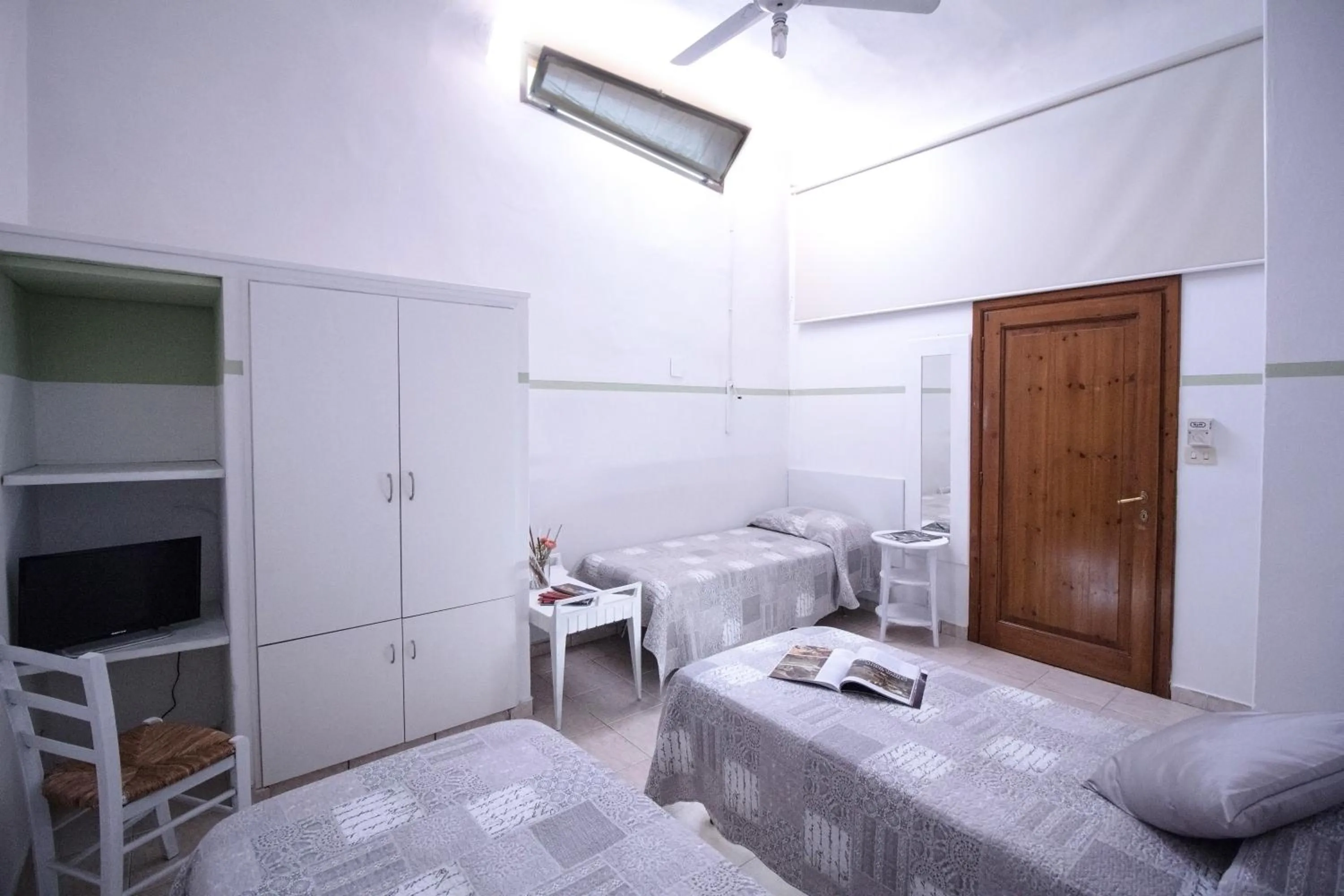 Bed in Il Ghiro Guest House