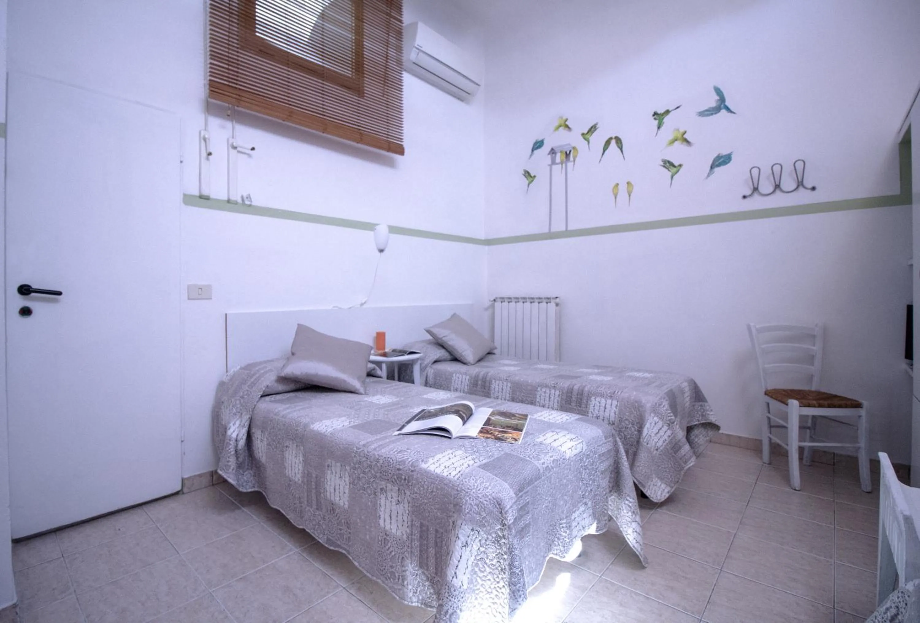 Bed in Il Ghiro Guest House
