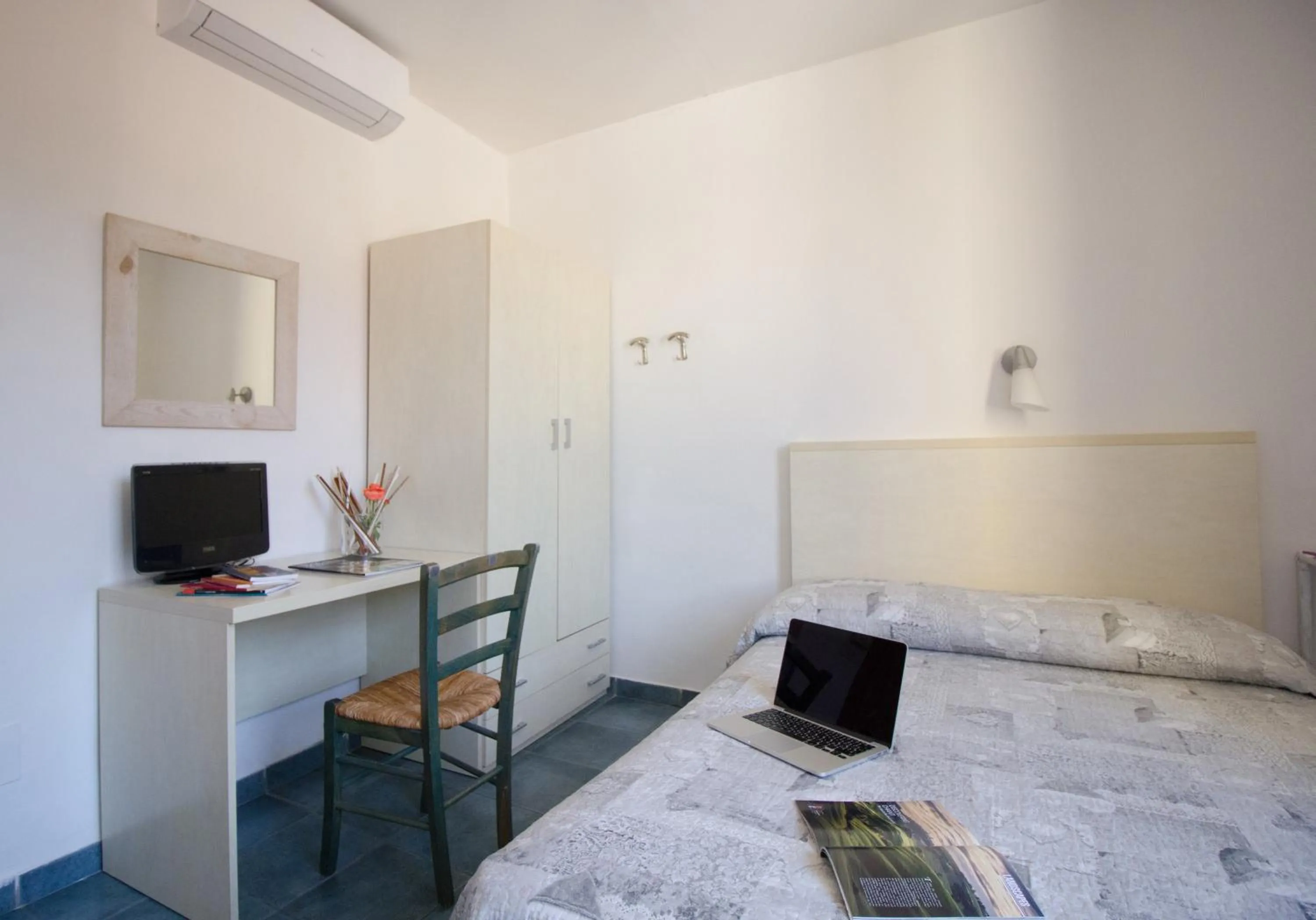 Bed in Il Ghiro Guest House