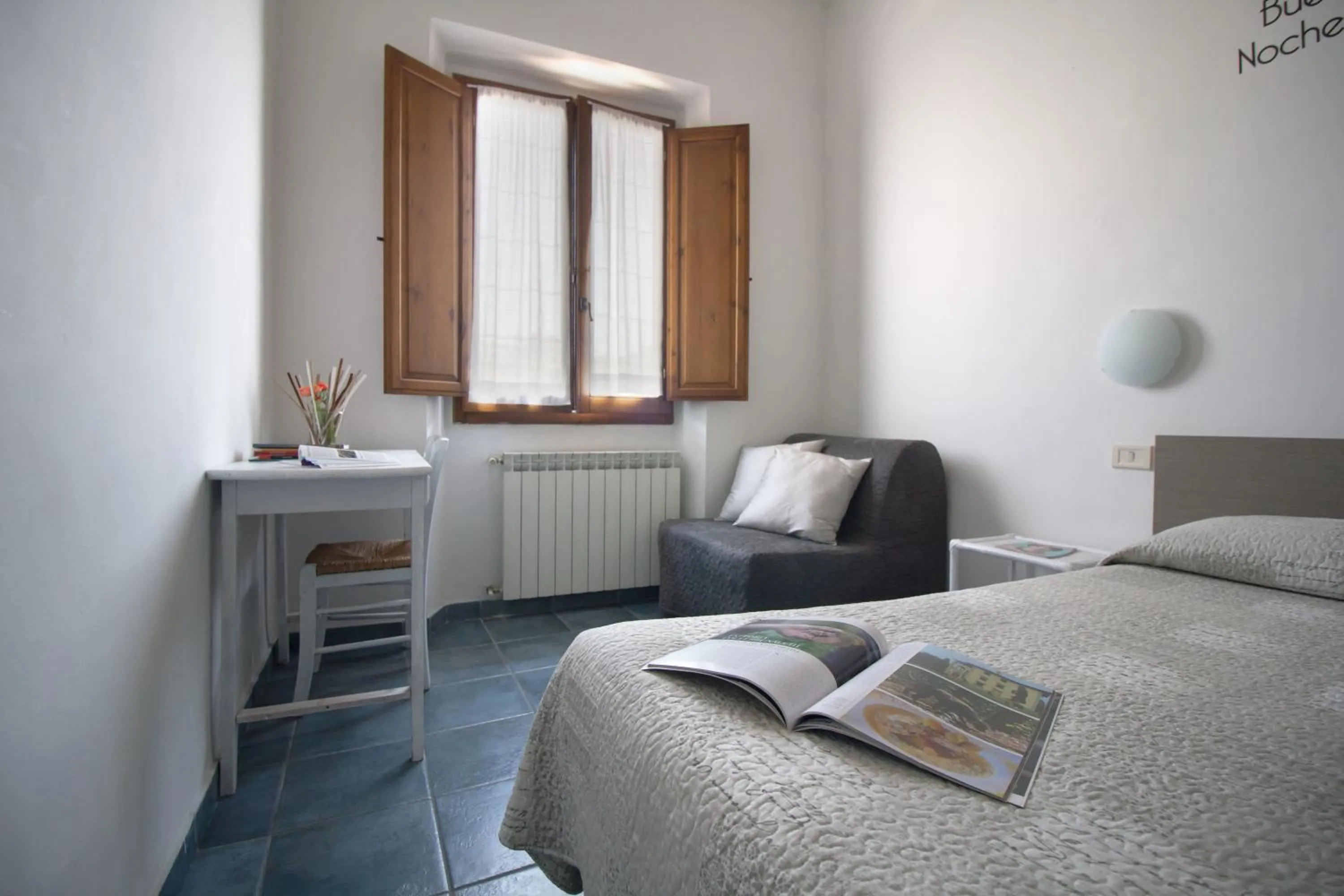 Bed in Il Ghiro Guest House