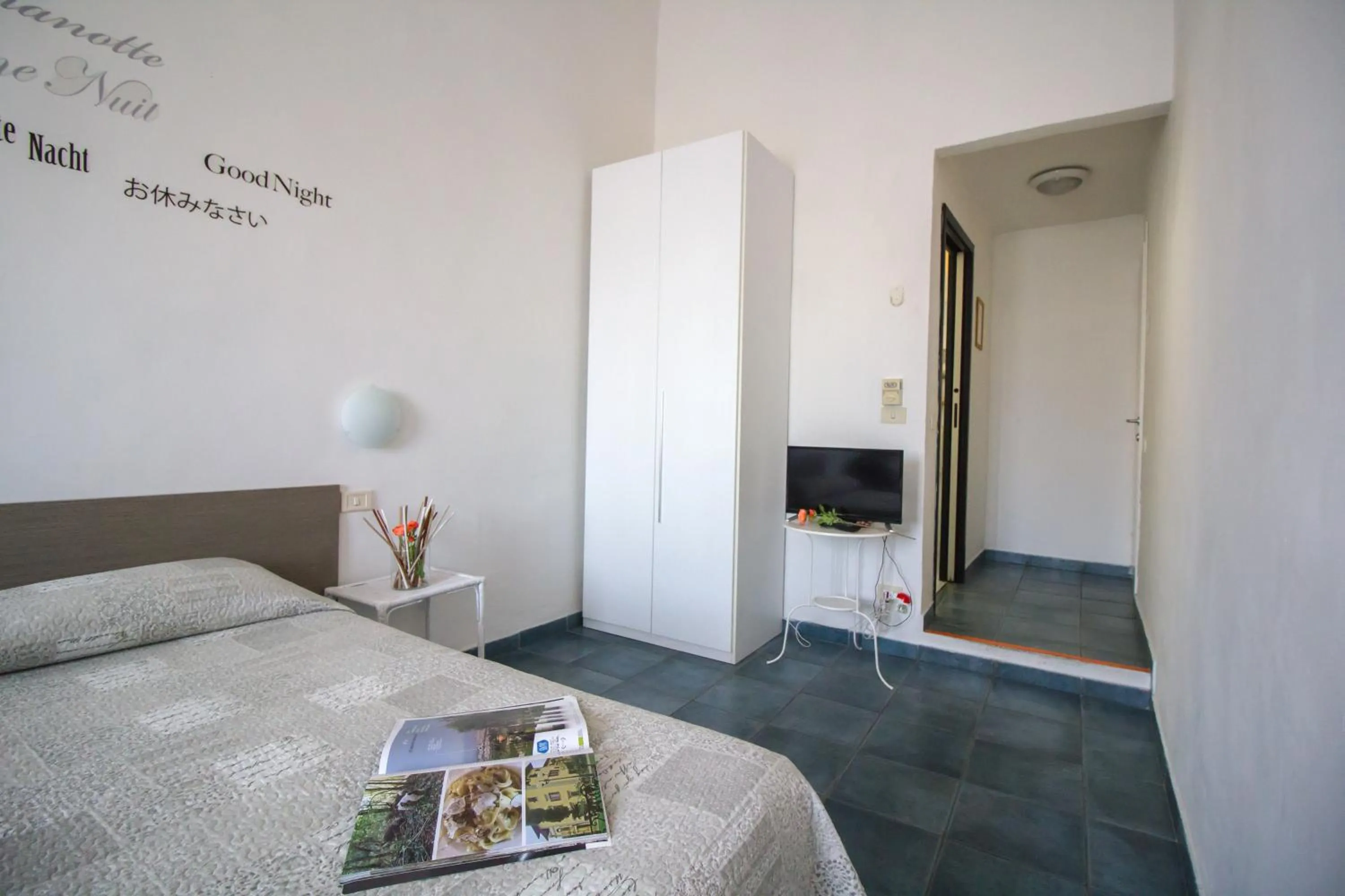 Bed in Il Ghiro Guest House