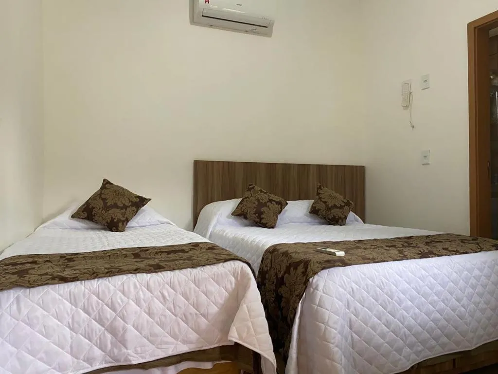 Bed in Pousada da Villa
