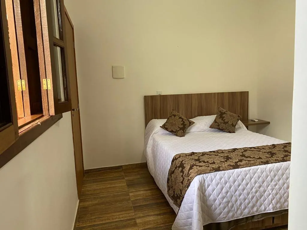 Bed in Pousada da Villa