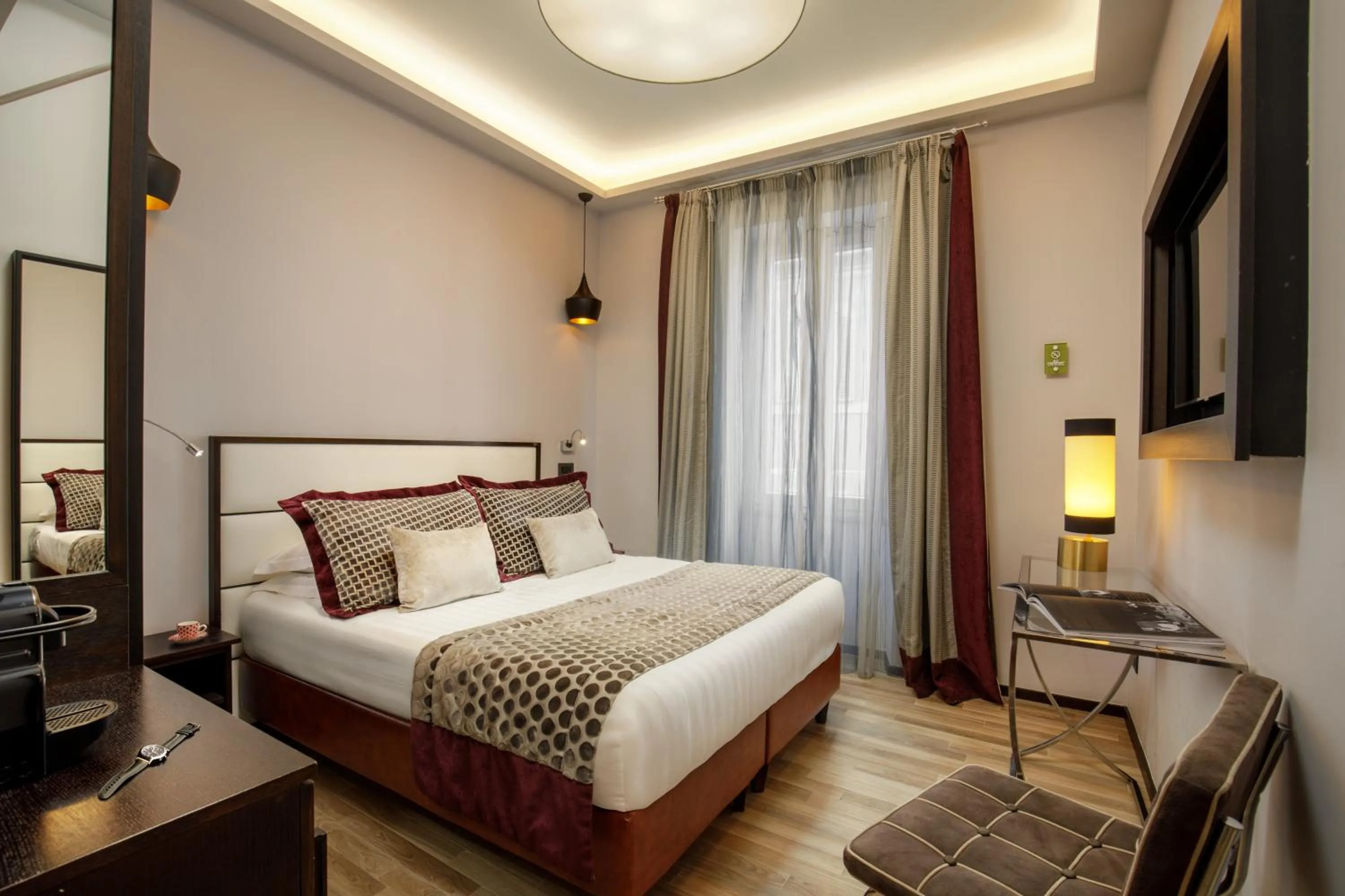 Bed in Flâneur Suites Corso