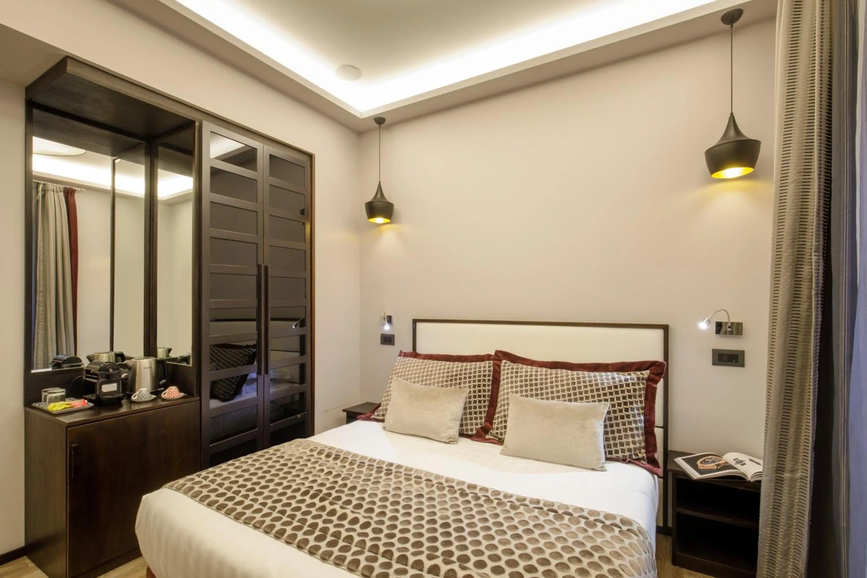 Bed in Flâneur Suites Corso