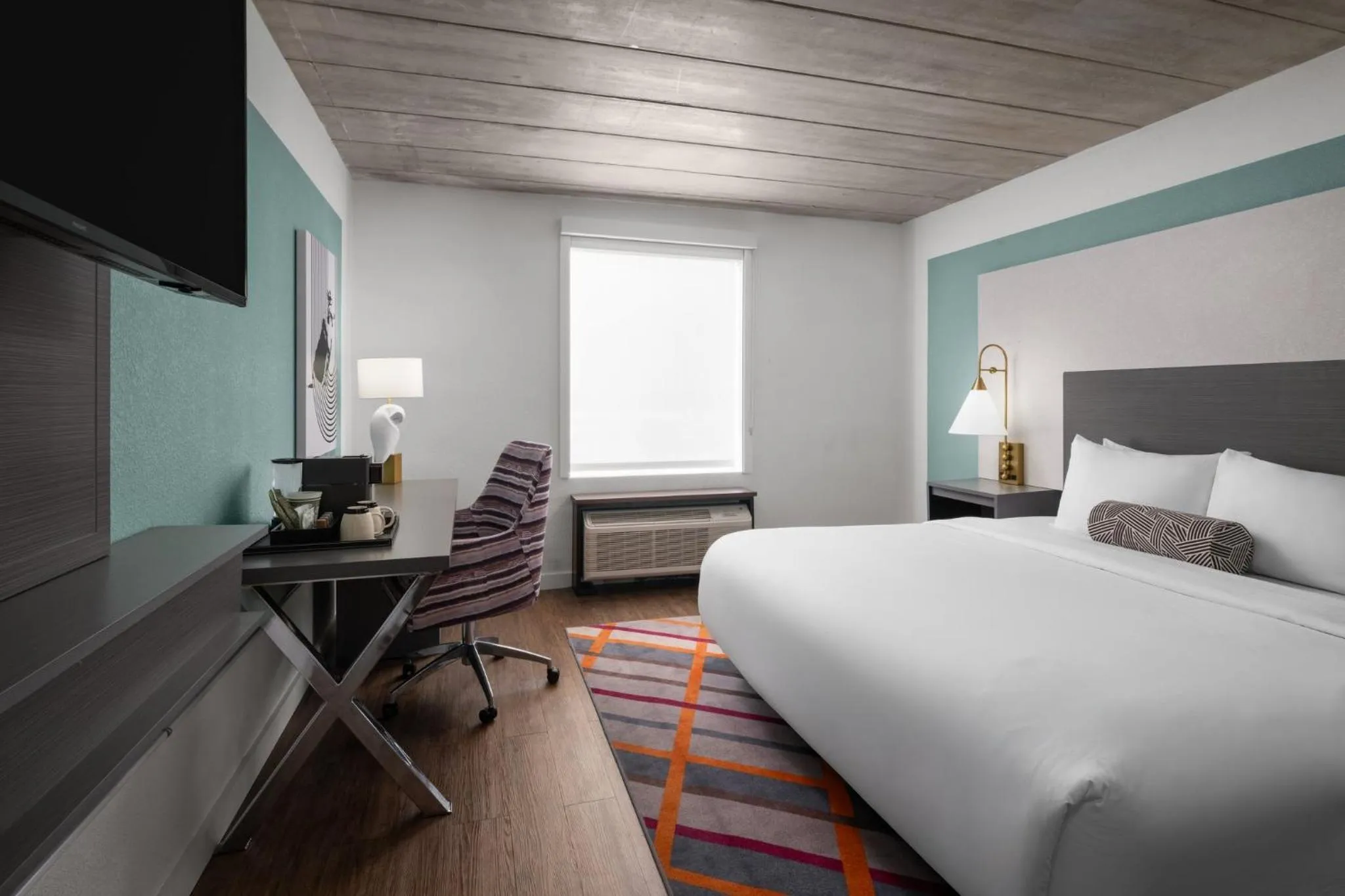 Photo of the whole room, Bed in voco College Station Aggieland by IHG