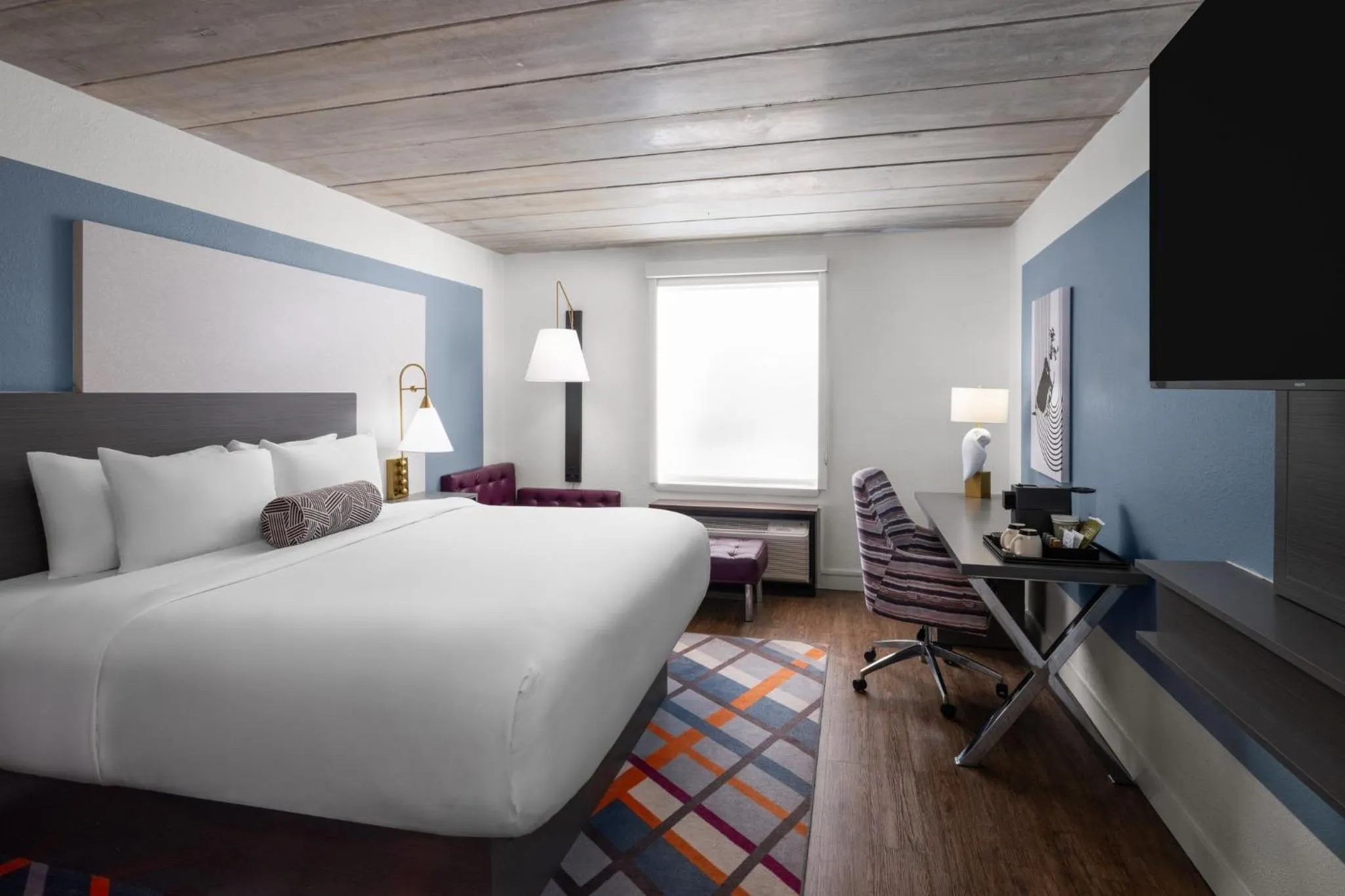 Photo of the whole room, Bed in voco College Station Aggieland by IHG