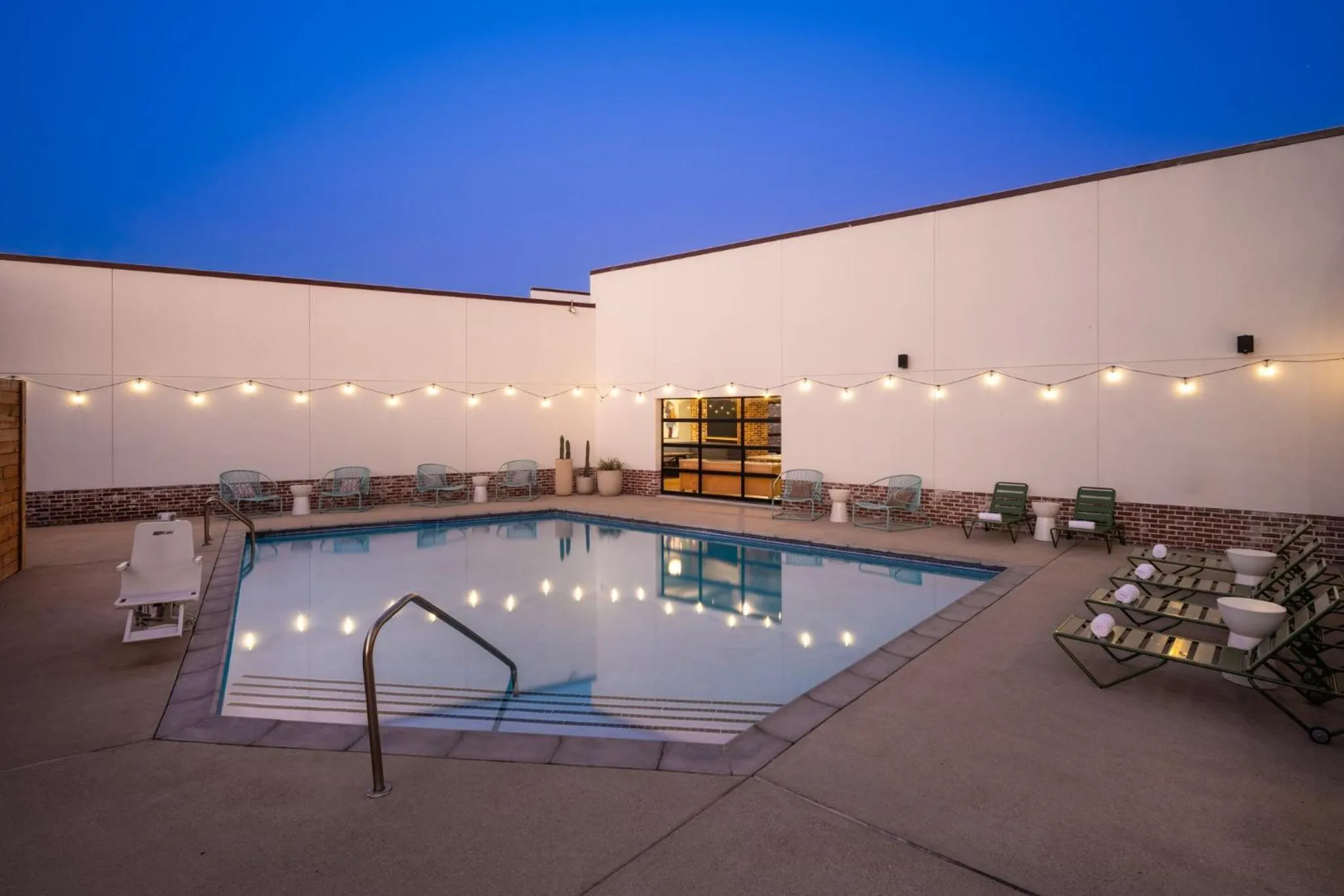 Swimming pool in voco College Station Aggieland by IHG