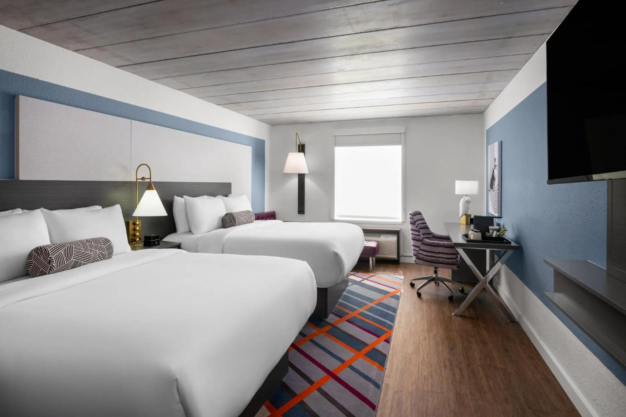 Photo of the whole room, Bed in voco College Station Aggieland by IHG