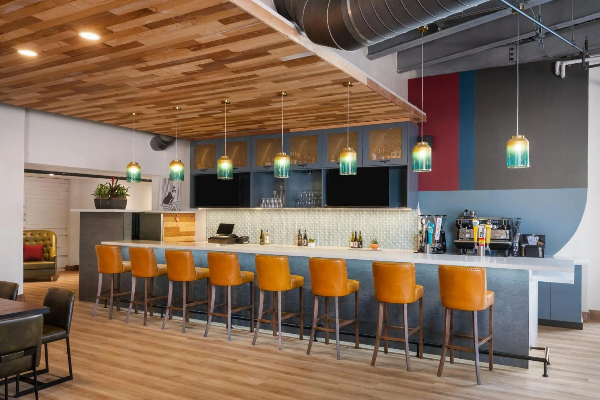 Lounge or bar in voco College Station Aggieland by IHG