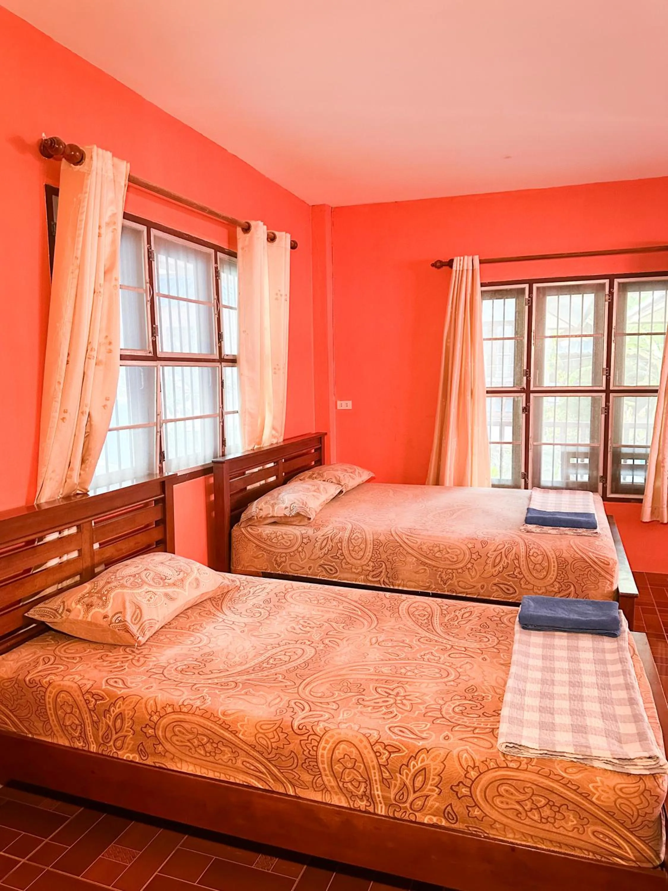 Bed in O'chai Bungalows