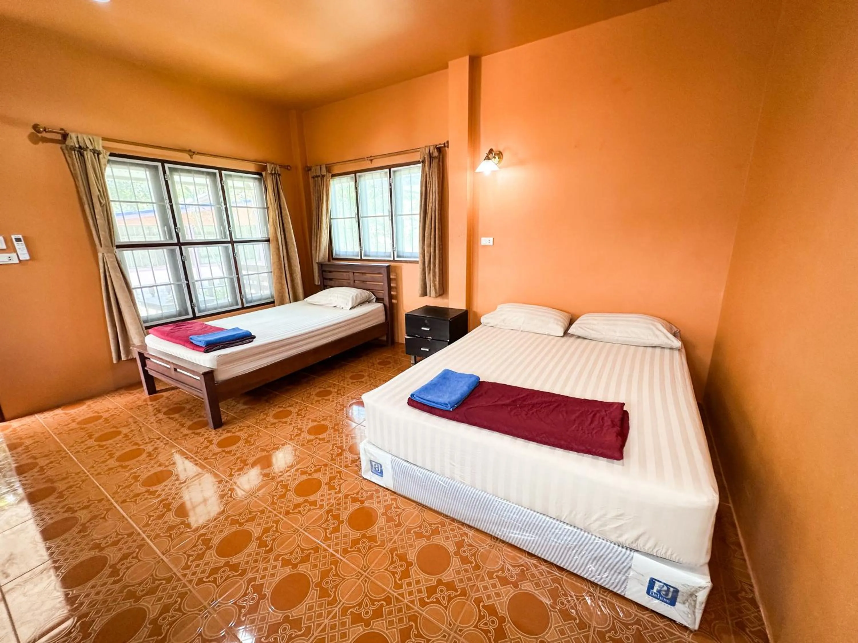 Bed in O'chai Bungalows