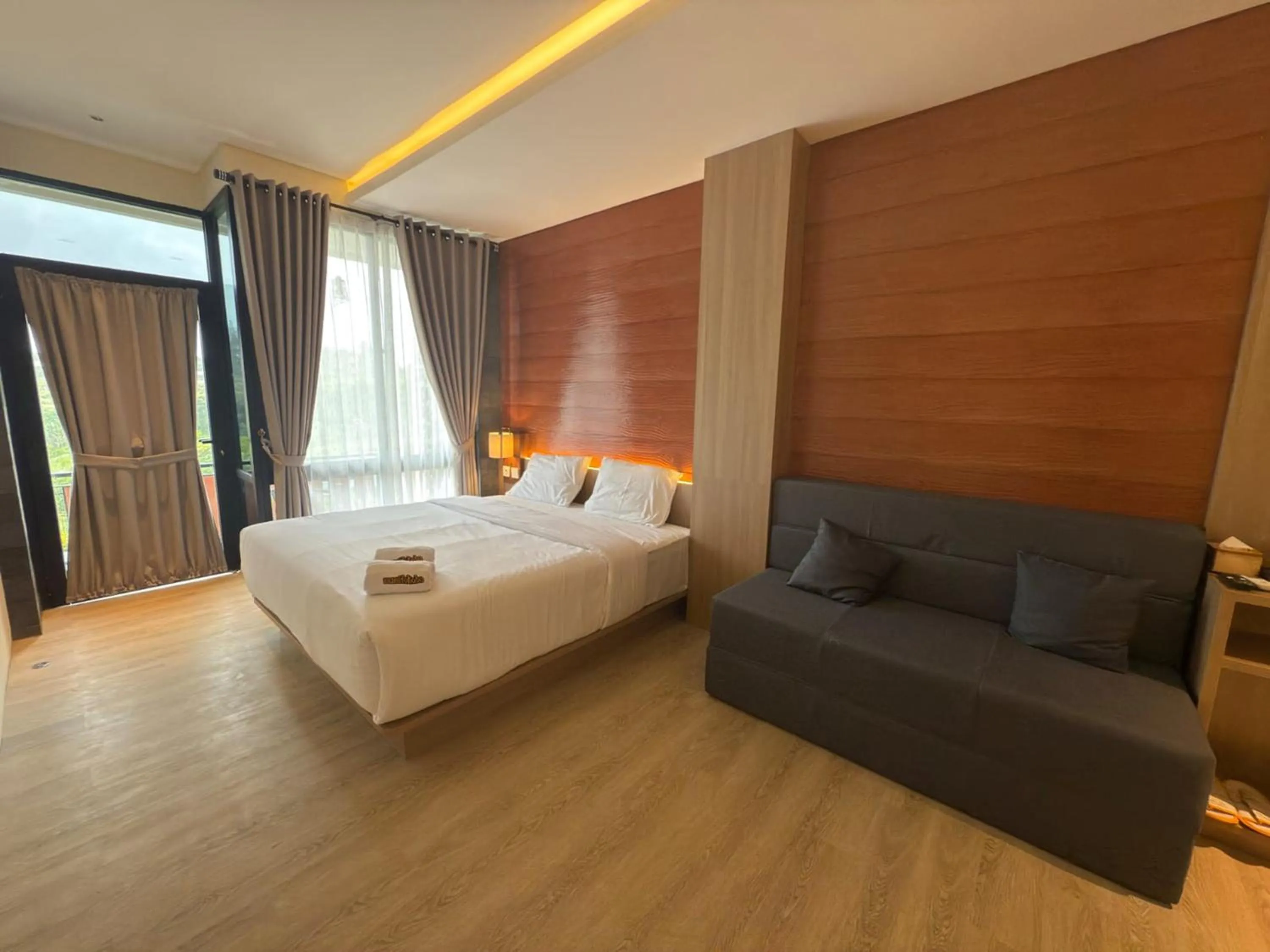 Bed in Mamifokobo Hotel & Glamping