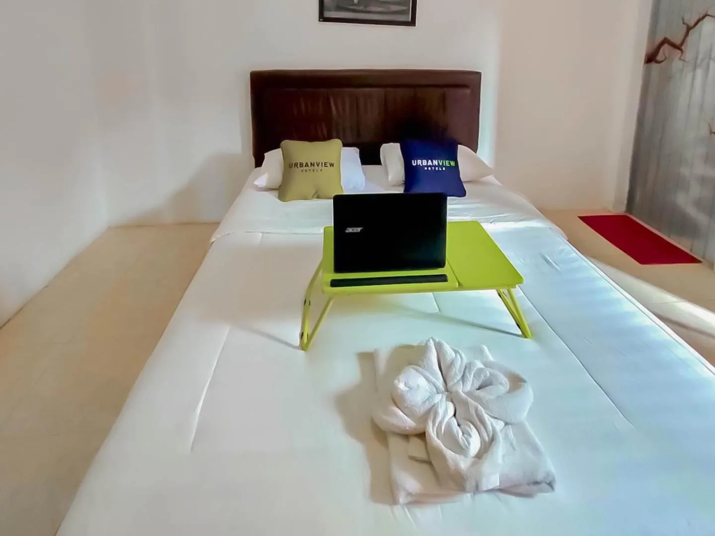 Bed in Urbanview Hotel Bagoes Sintang by RedDoorz