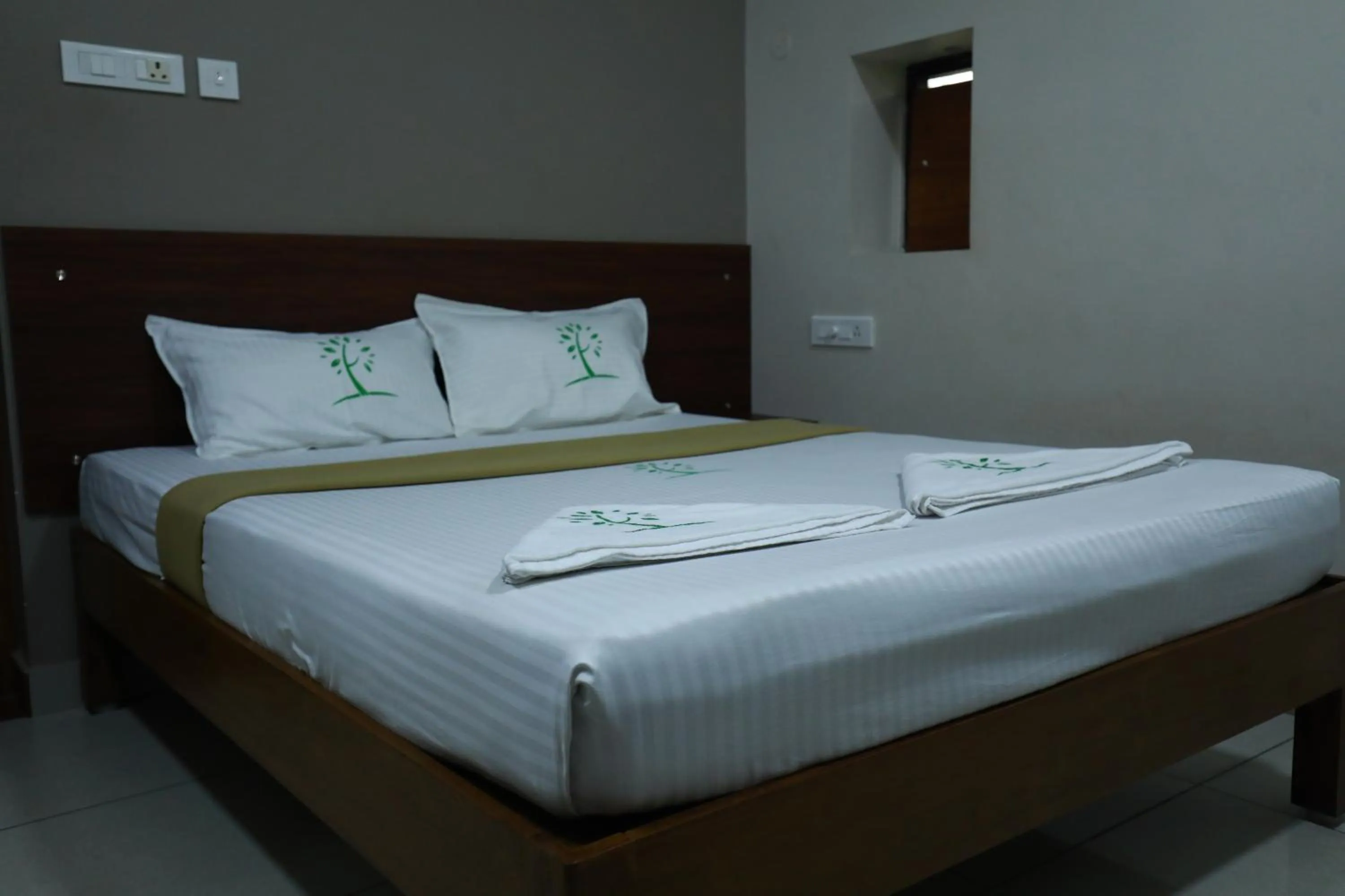 Bed in The Ideal Nest Kumbakonam