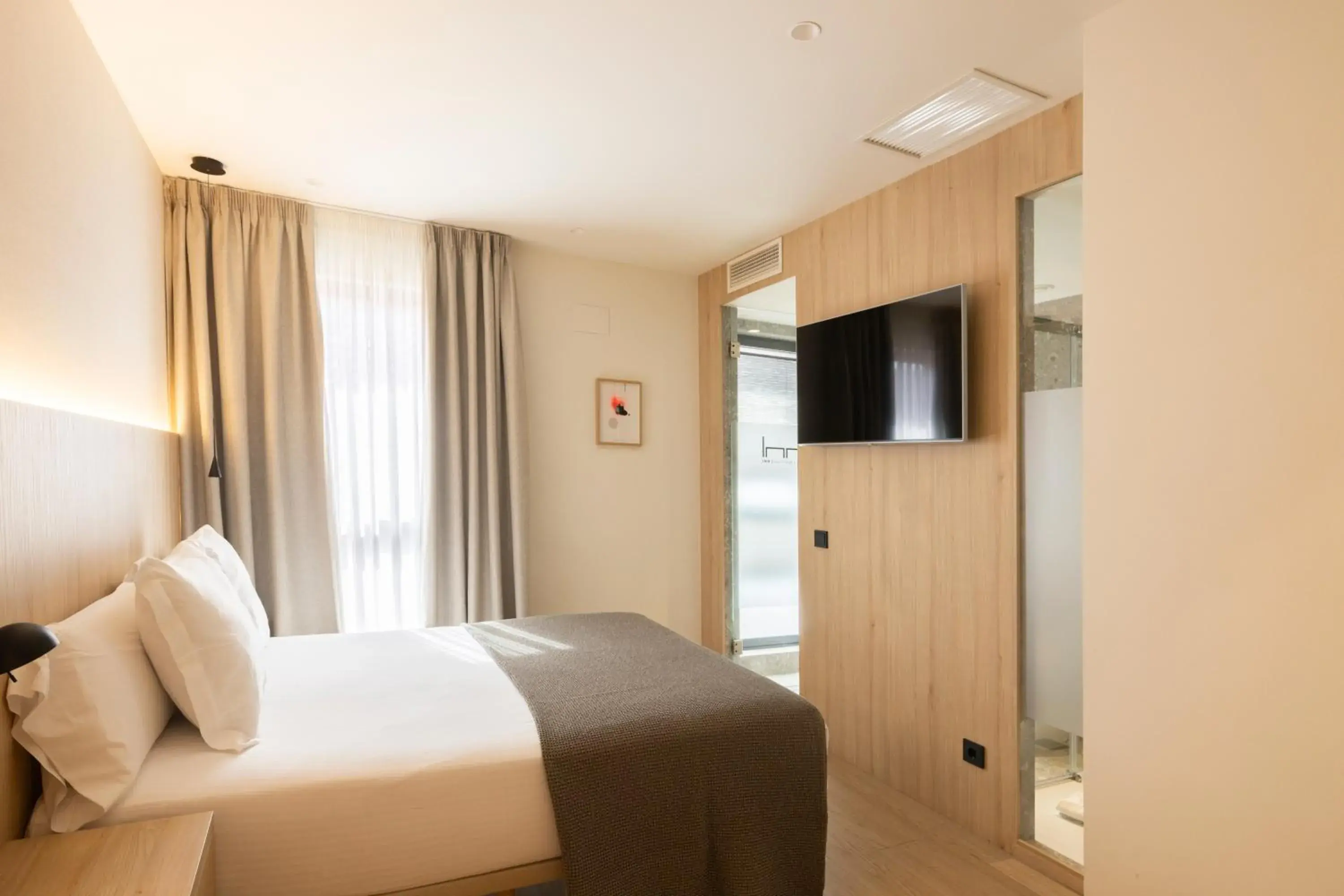 Photo of the whole room, Bed in Inn Boutique León Photo of the whole room, Bed in Inn Boutique León