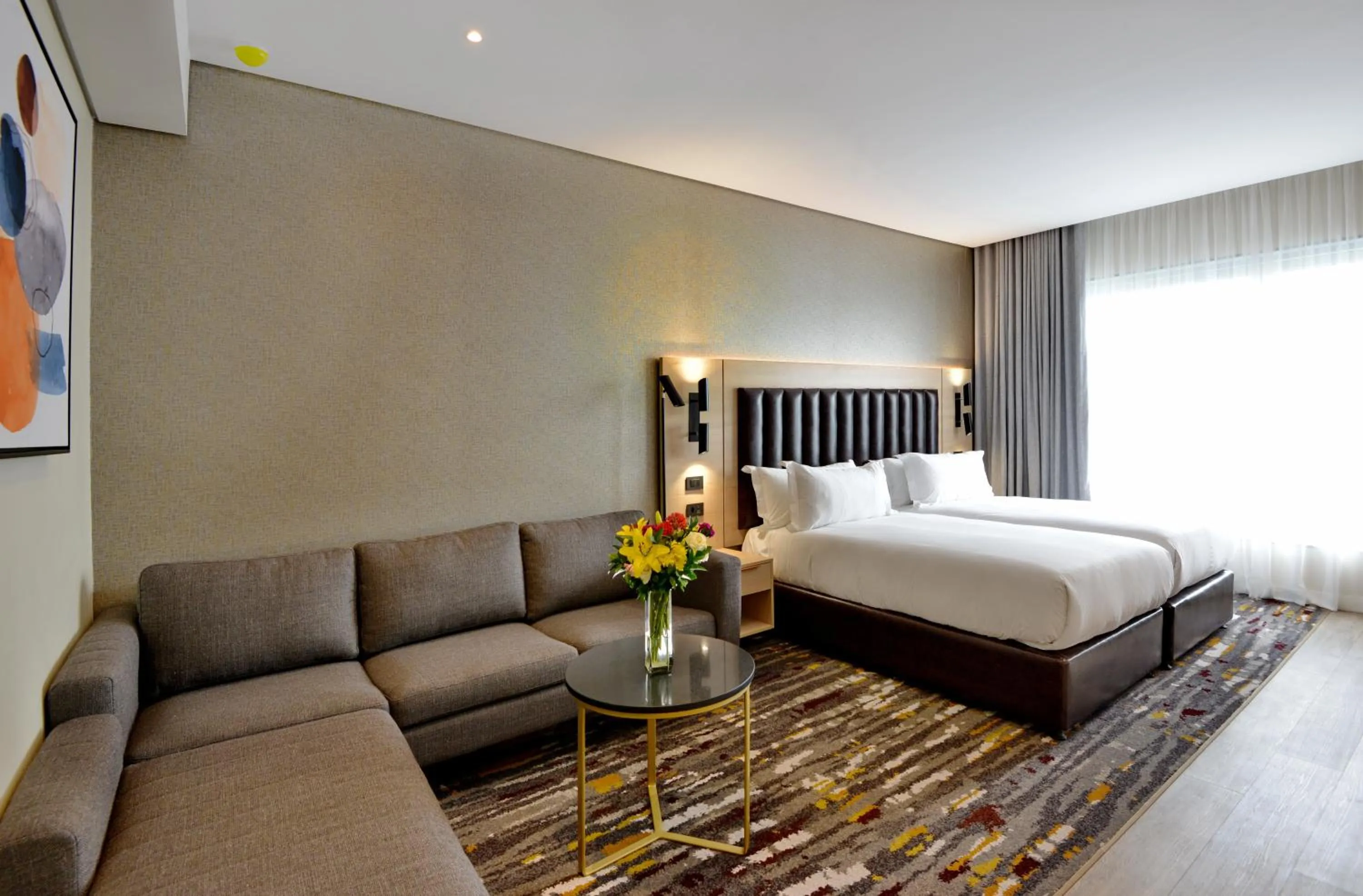 Photo of the whole room, Bed in @Sandton Hotel