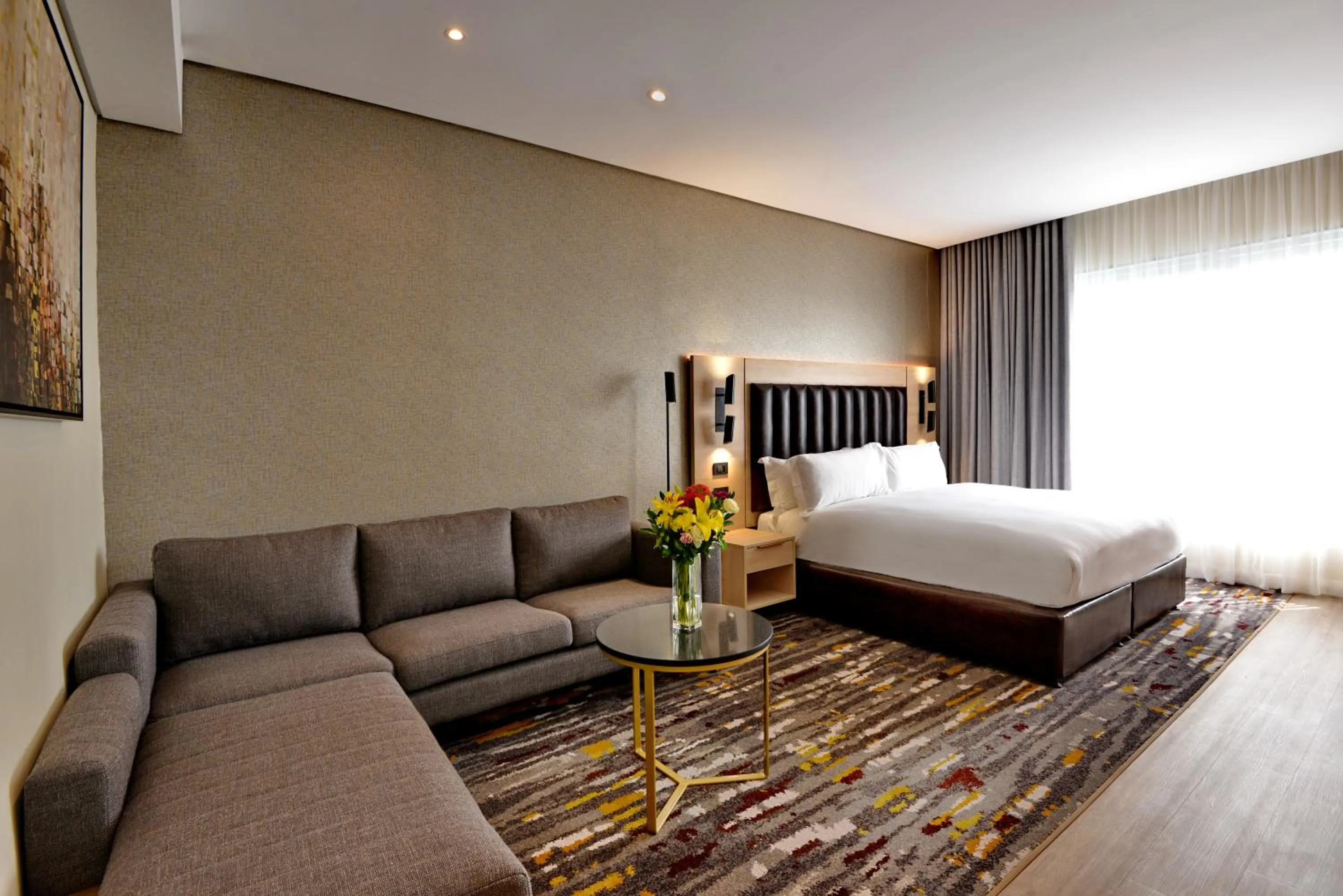 Photo of the whole room, Bed in @Sandton Hotel