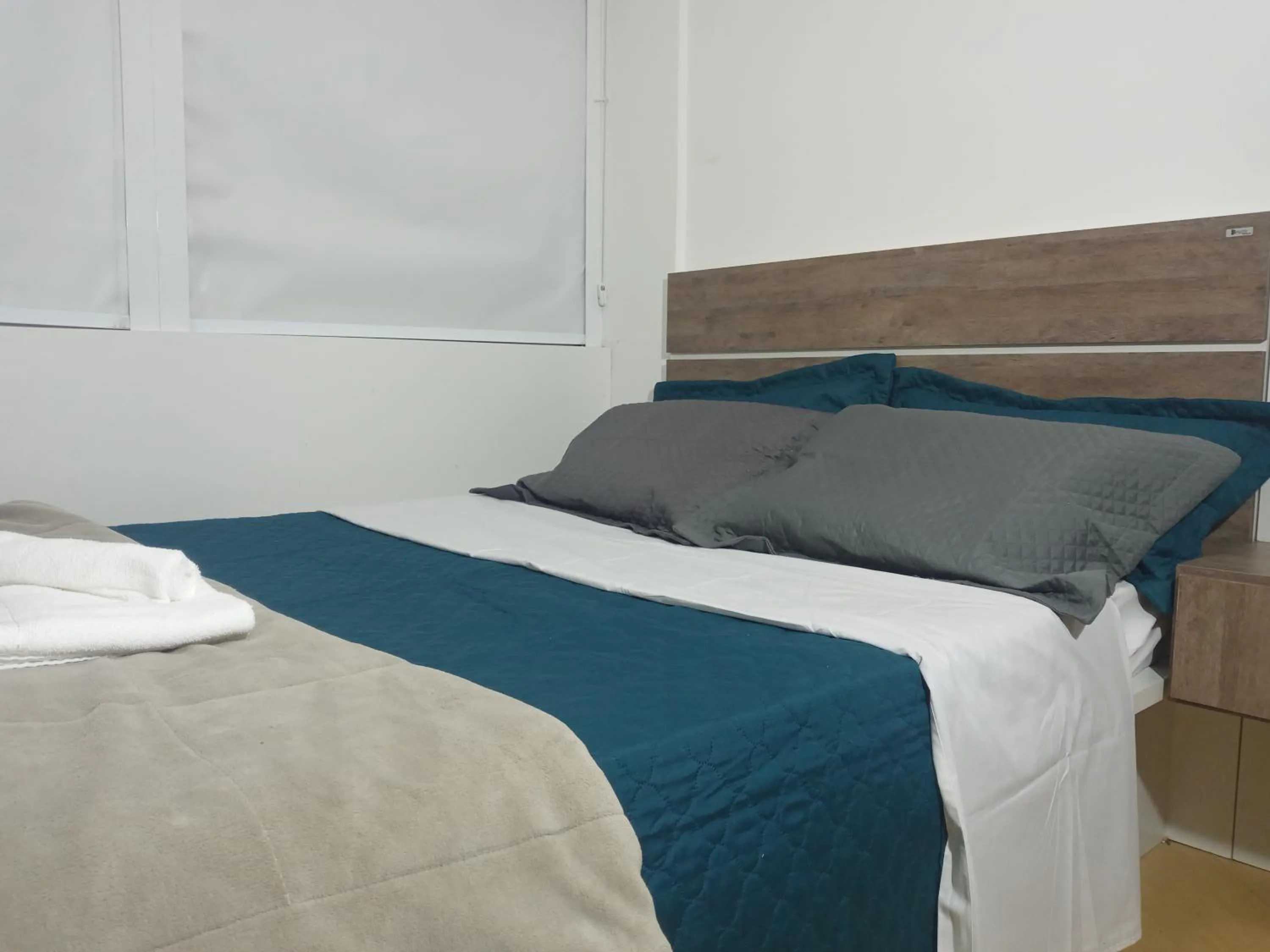 Bed in Apartamento encantador em Curitiba