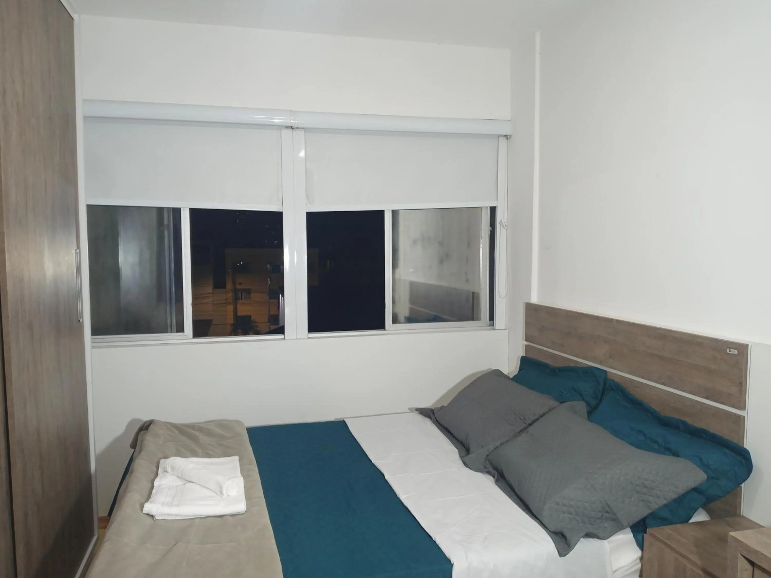 Bed in Apartamento encantador em Curitiba