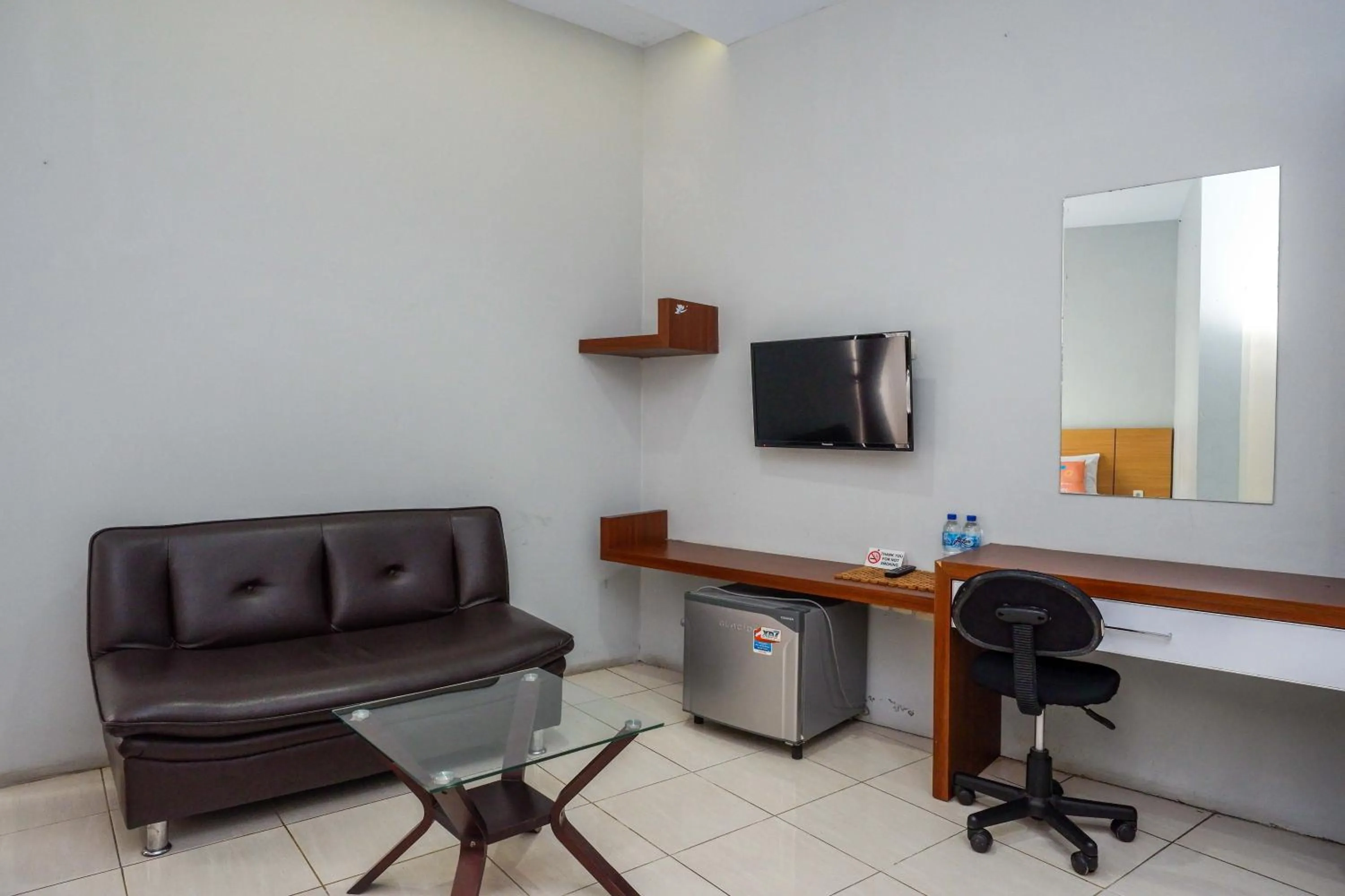 Bedroom in Sans Hotel Absari Yogyakarta