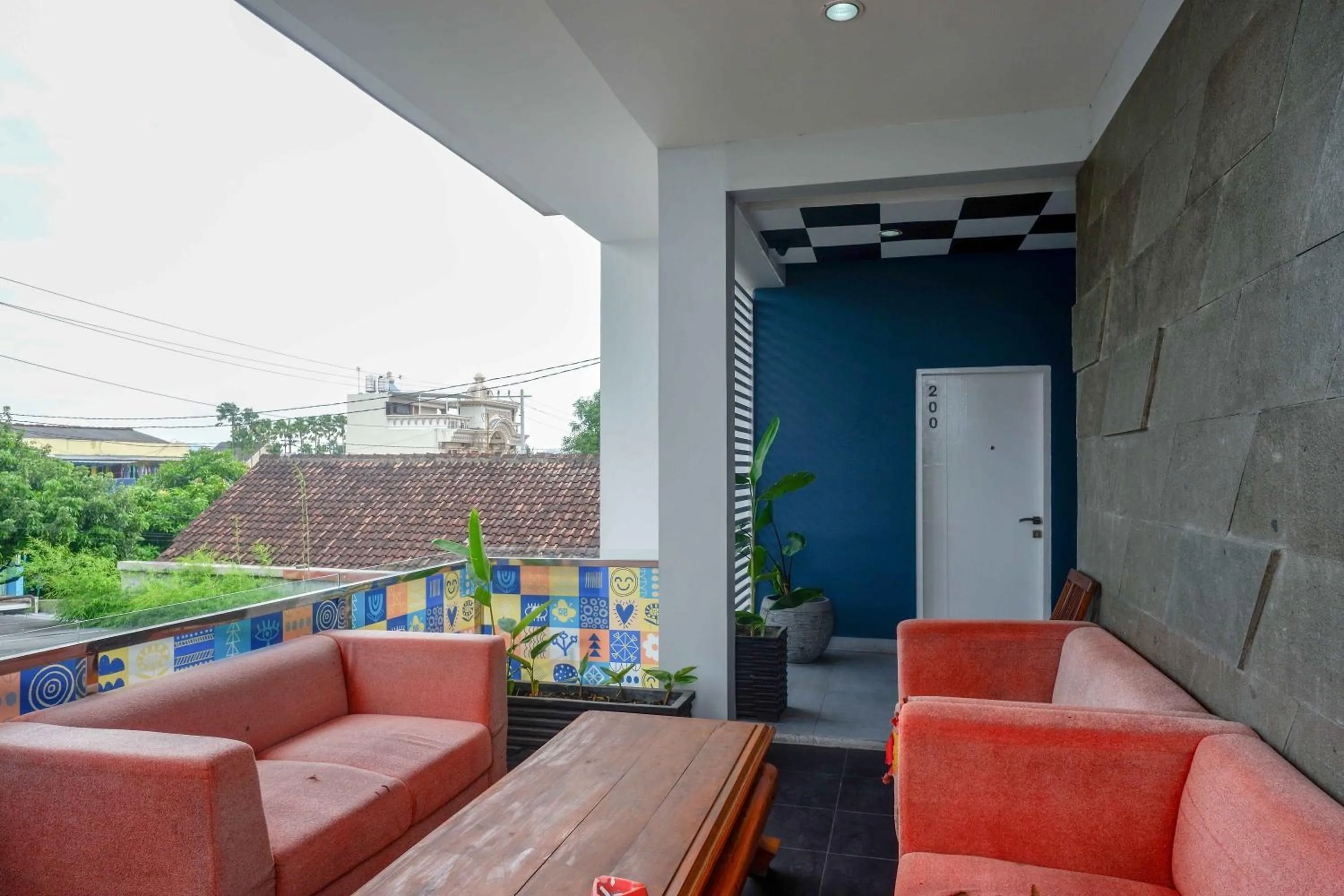 Seating area in Sans Hotel Absari Yogyakarta