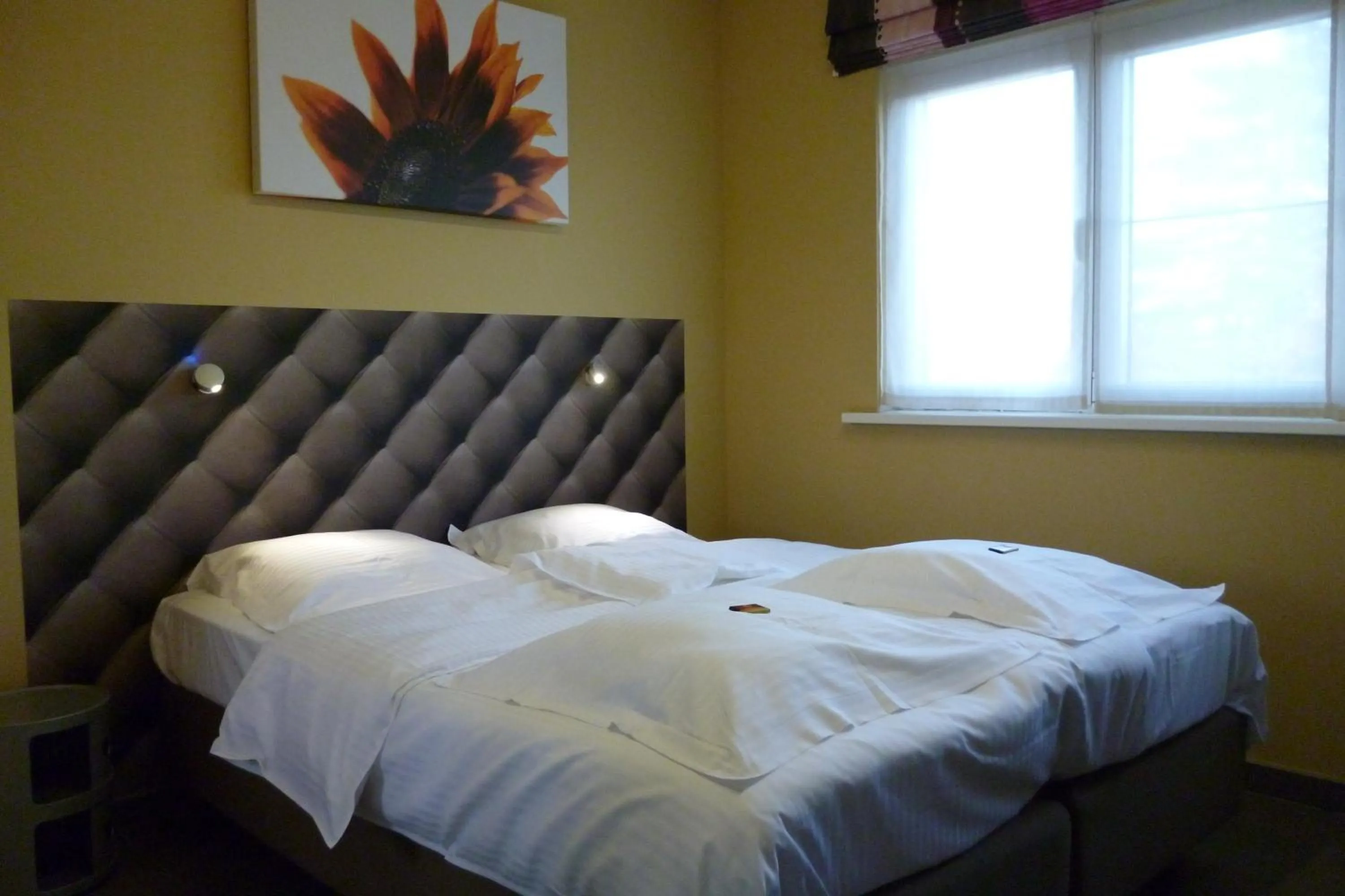 Bed in Su'ro Bed and Breakfast