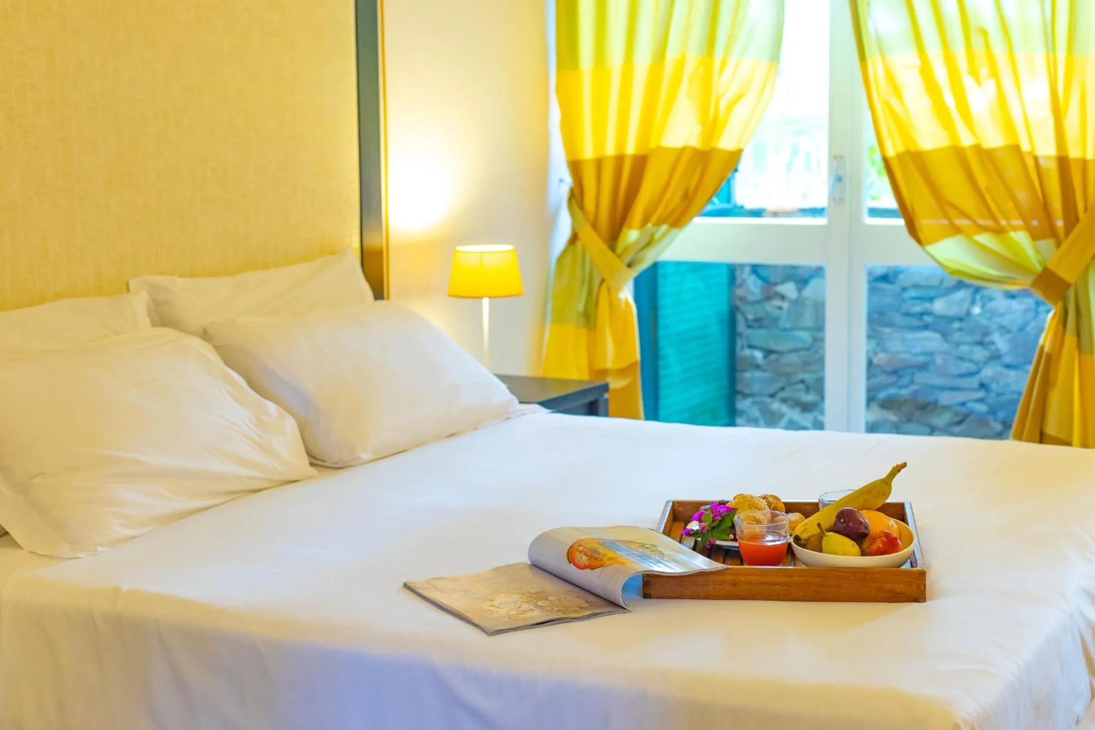 Food, Bed in UNAHOTELS Club Hotel Ancora