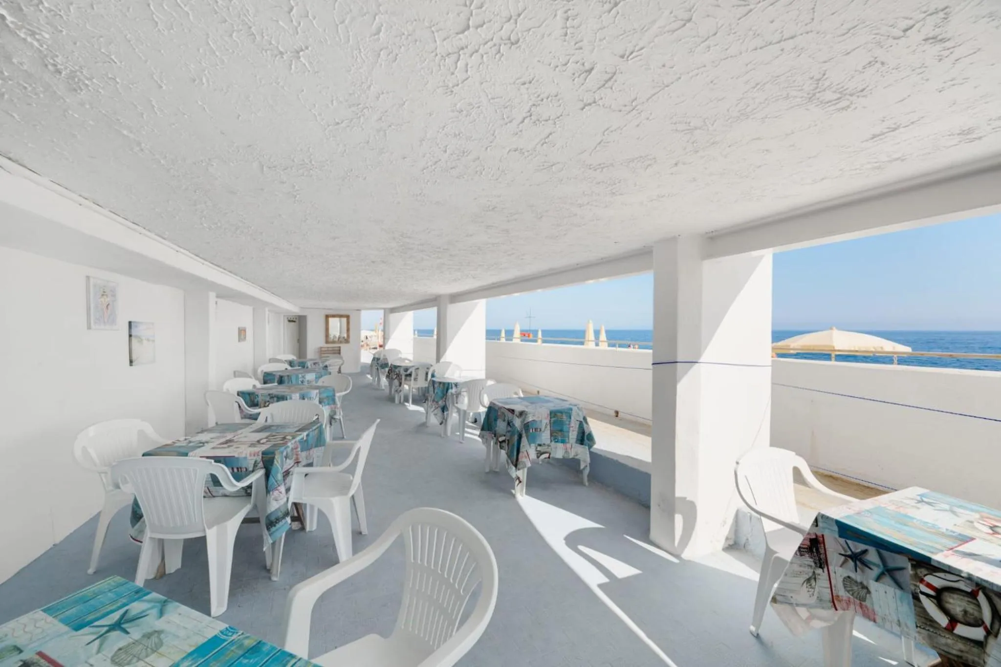 Lounge or bar in Hotel La Perla Del Capo