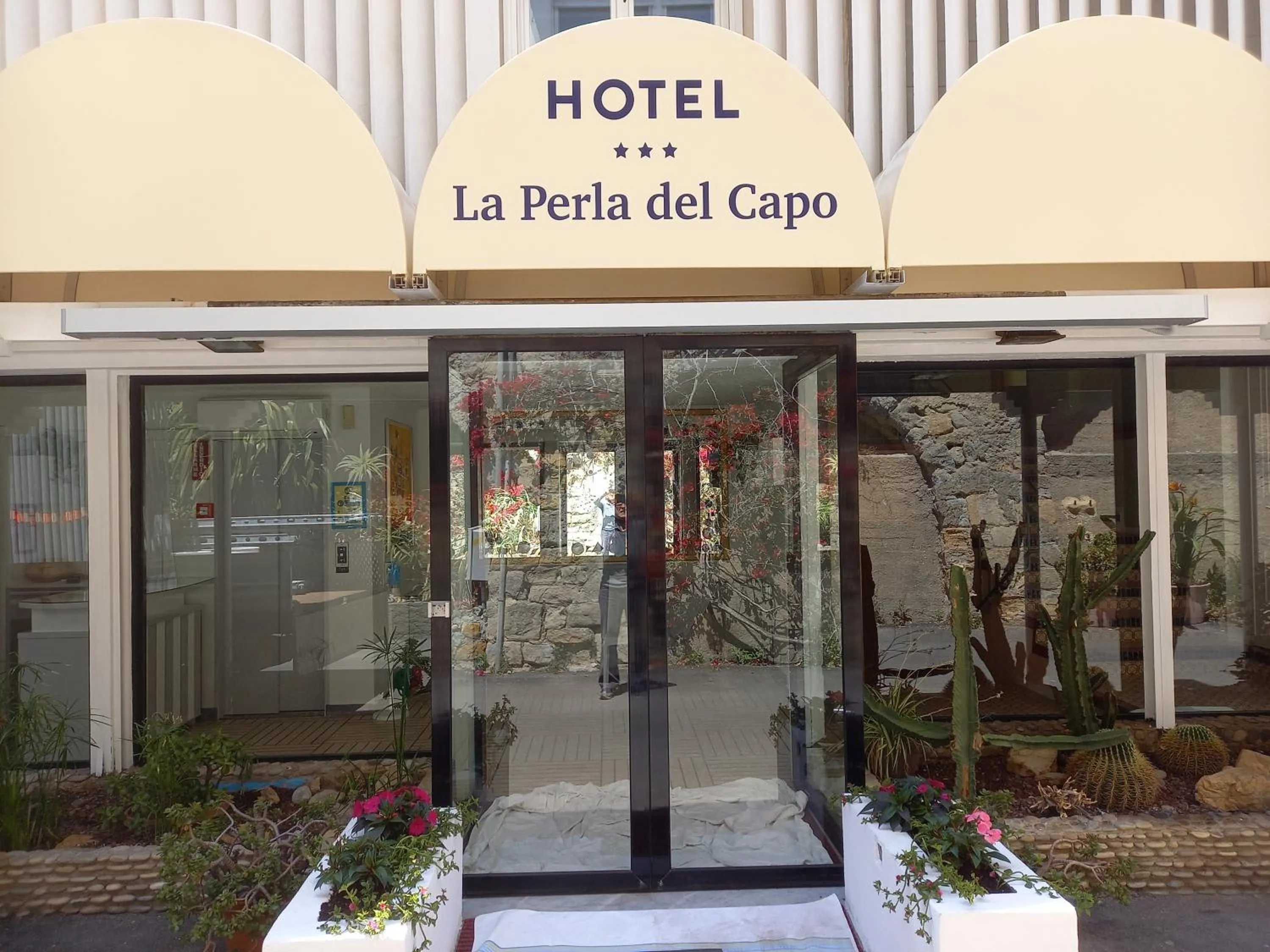 Property building in Hotel La Perla Del Capo