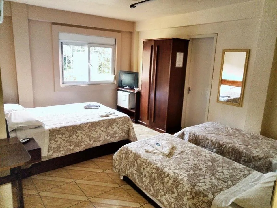 Bed in Hotel Pequenino