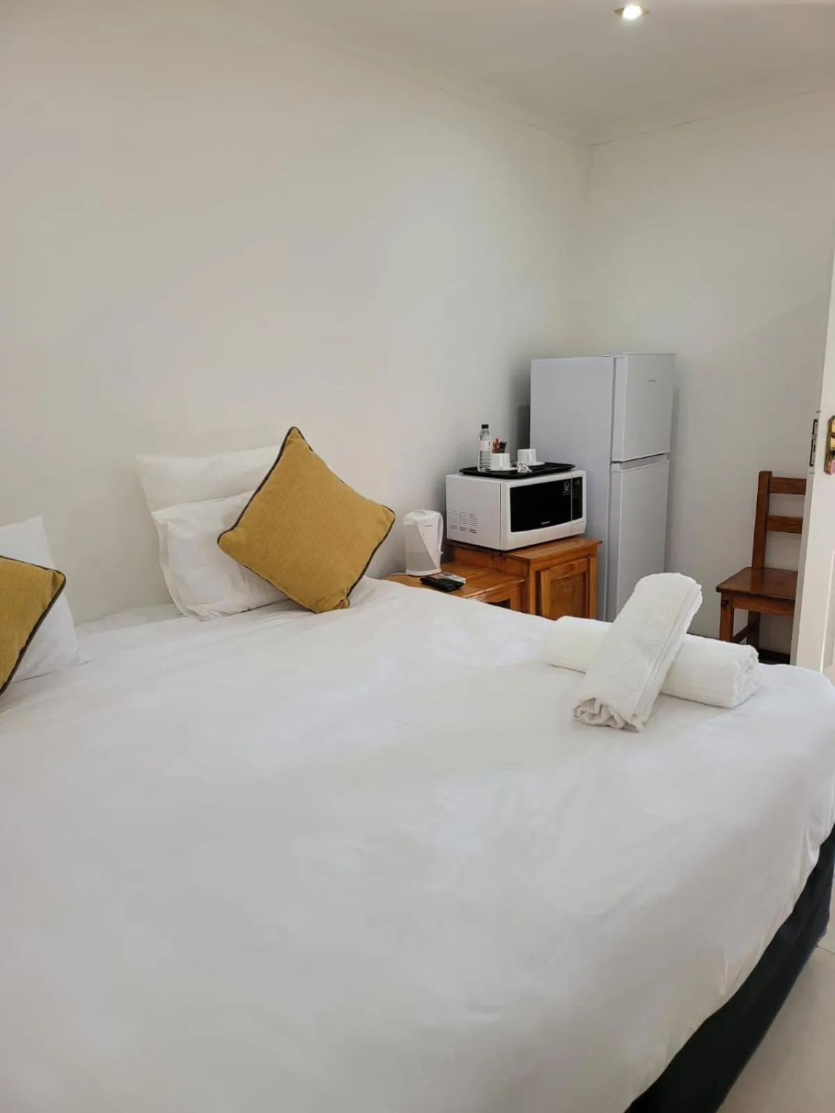 Bed in Heroes Garden Lodge