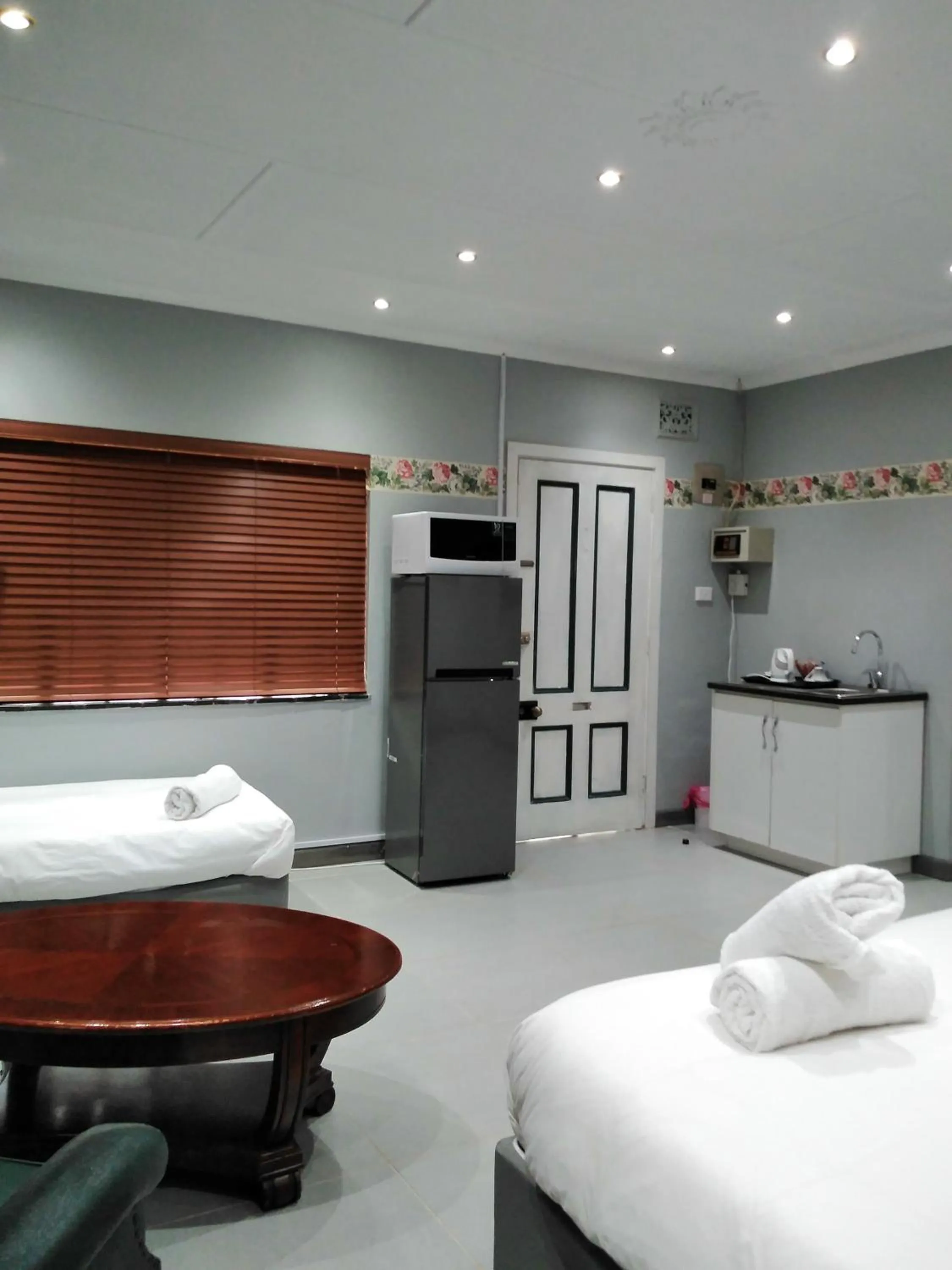 Bed in Heroes Garden Lodge