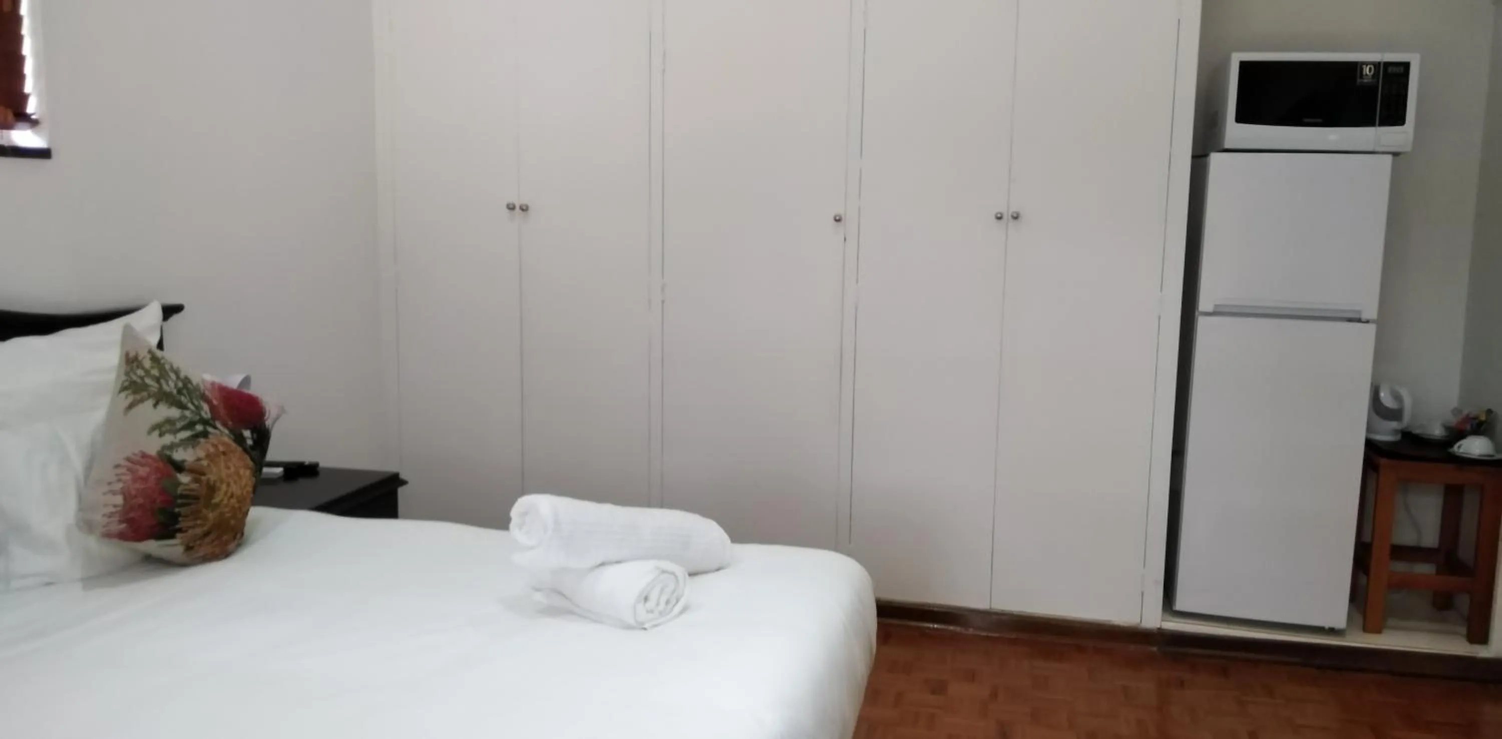 Bed in Heroes Garden Lodge